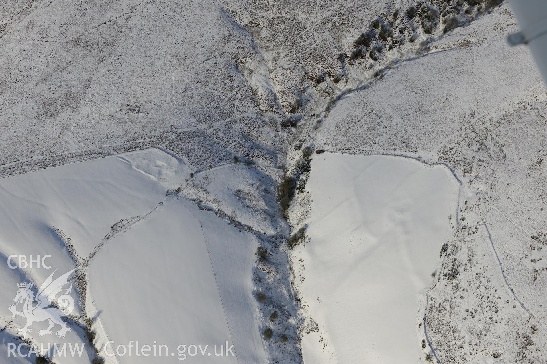 Cwm-Twrch Medieval platform settlement and deserted rural settlement, Glascwm. Oblique aerial photograph taken during the Royal Commission?s programme of archaeological aerial reconnaissance by Toby Driver on 15th January 2013.