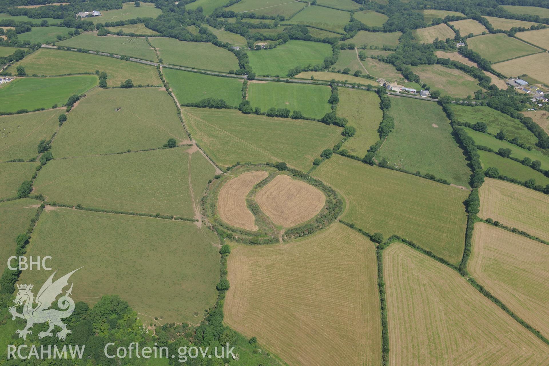 Castell Mawr henge or hillfort, Meline, south west of Cardigan. Oblique aerial photograph taken during the Royal Commission?s programme of archaeological aerial reconnaissance by Toby Driver on 12th July 2013.