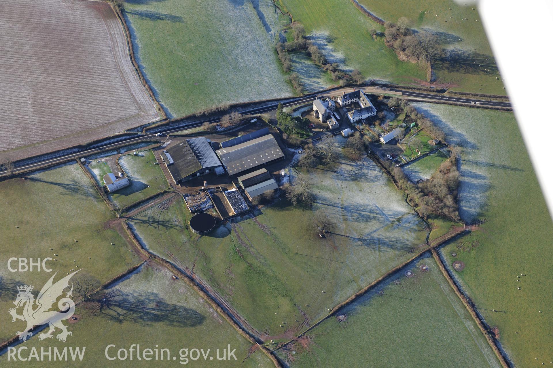 Trebarries mansion with its associated gardens and stable block, north west of Talgarth, Breconshire. Oblique aerial photograph taken during the Royal Commission?s programme of archaeological aerial reconnaissance by Toby Driver on 15th January 2013.