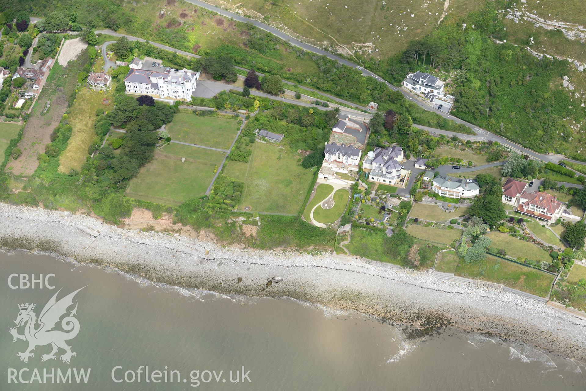 Gogarth Abbey convalescent home or hotel and garden; Gogarth Abbey remains and Gogarth Abbey Lodge. Oblique aerial photograph taken during the Royal Commission's programme of archaeological aerial reconnaissance by Toby Driver on 30th July 2015.