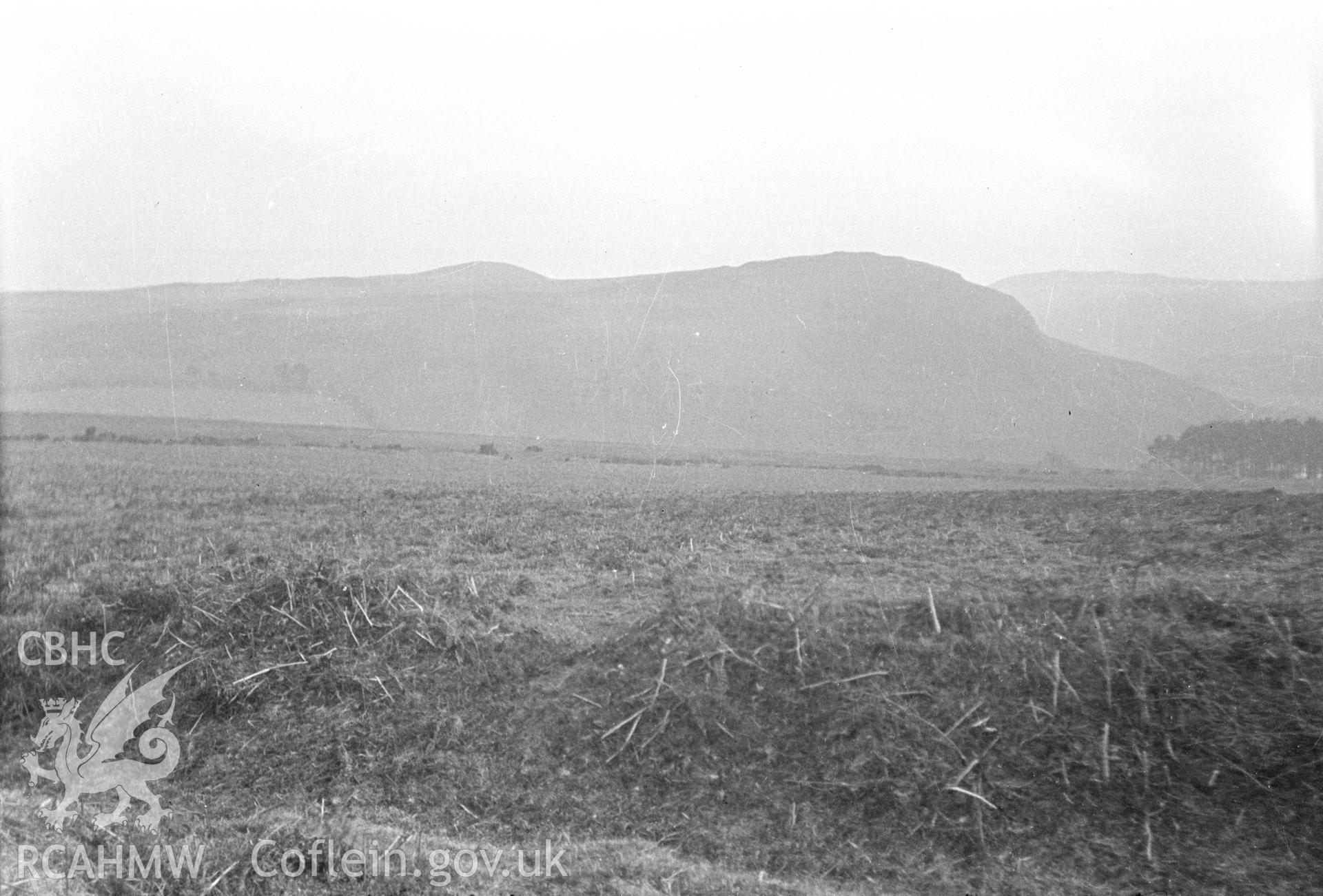 Digital copy of nitrate negative showing Careg-Wiber bank earthworks. From the Cadw Monuments in Care Collection.