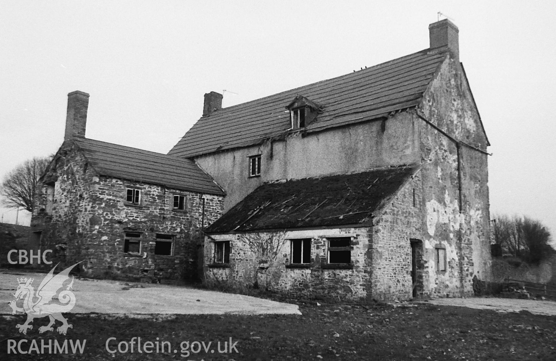 Digitised black and white photograph showing exterior view of Penrhos Farmhouse, Caerleon, taken by Paul Davis in 1997.