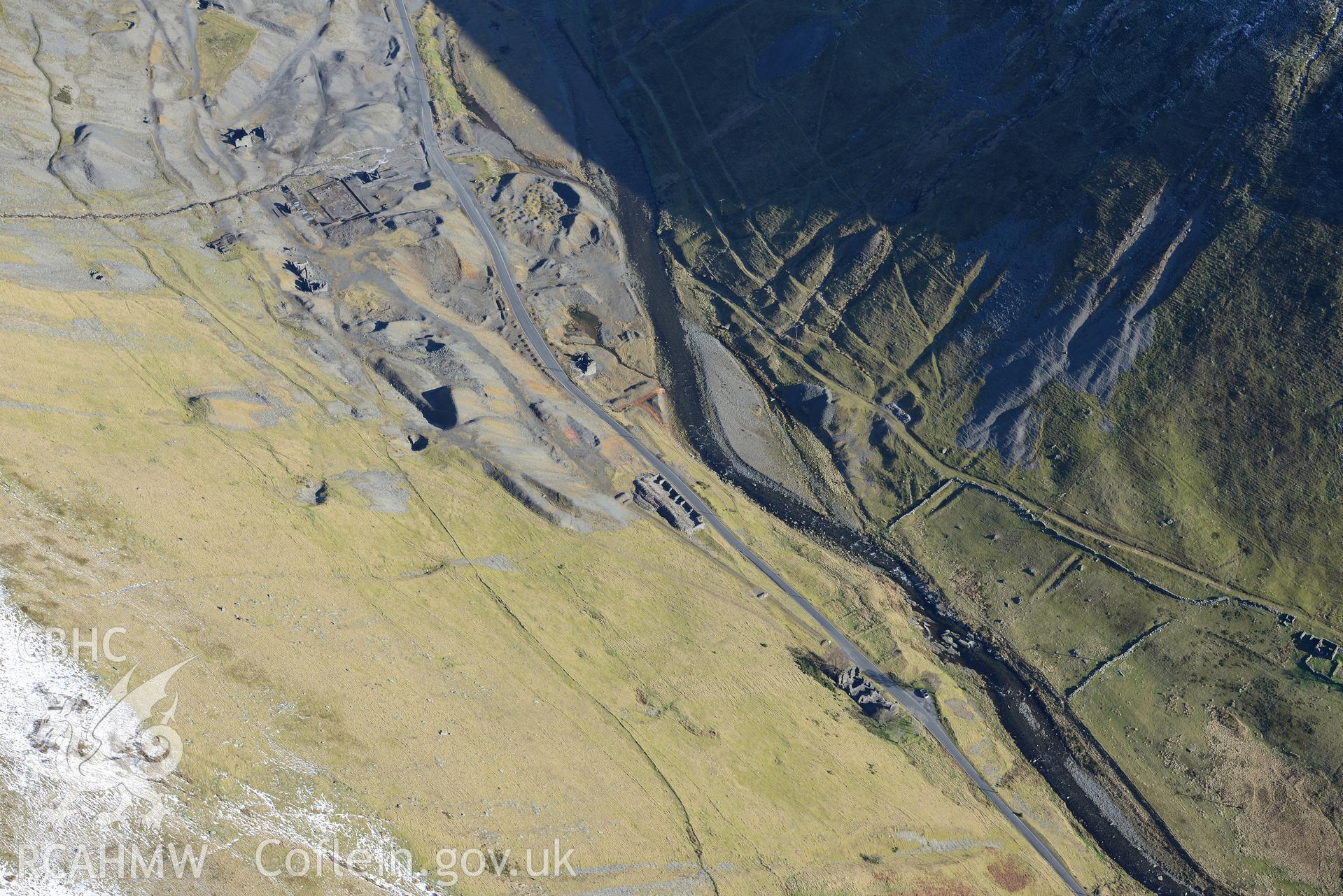 Nevill Place Miners' Cottages; dressing mill;lead mine barracks; office and smithy at Cwmystwyth Lead Mine. Oblique aerial photograph taken during the Royal Commission's programme of archaeological aerial reconnaissance by Toby Driver, 4th February 2015.