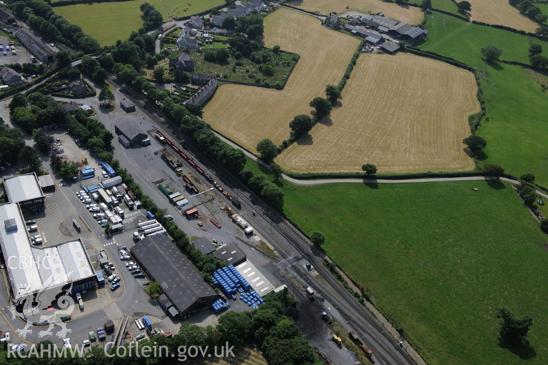 Dinas Junction railway station, Welsh Highland Railway. Oblique aerial photograph taken during the Royal Commission?s programme of archaeological aerial reconnaissance by Toby Driver on 12th July 2013.