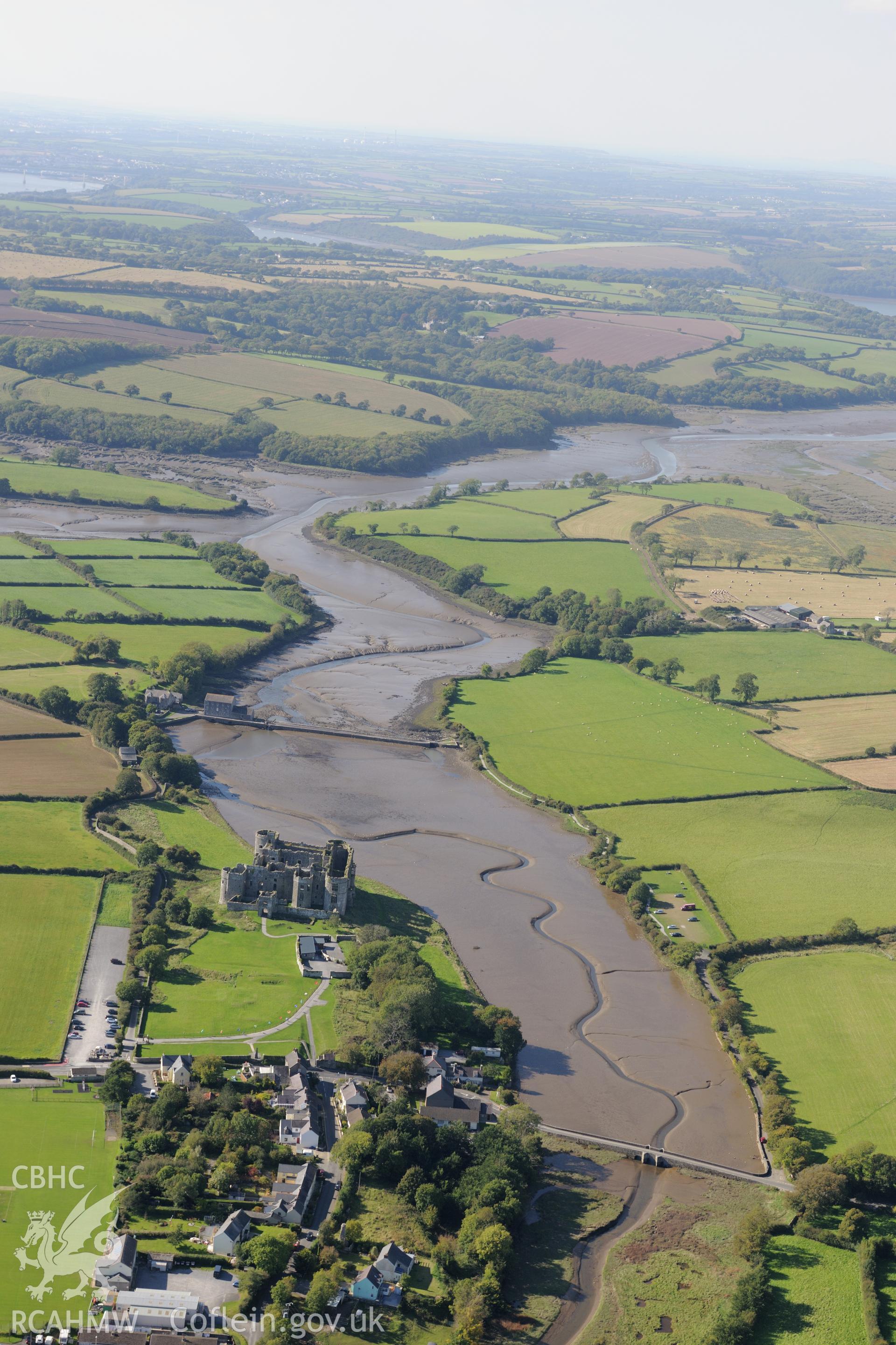 Carew Castle, its gardens and its grounds, Carew, east of Pembroke Dock. Oblique aerial photograph taken during the Royal Commission's programme of archaeological aerial reconnaissance by Toby Driver on 30th September 2015.