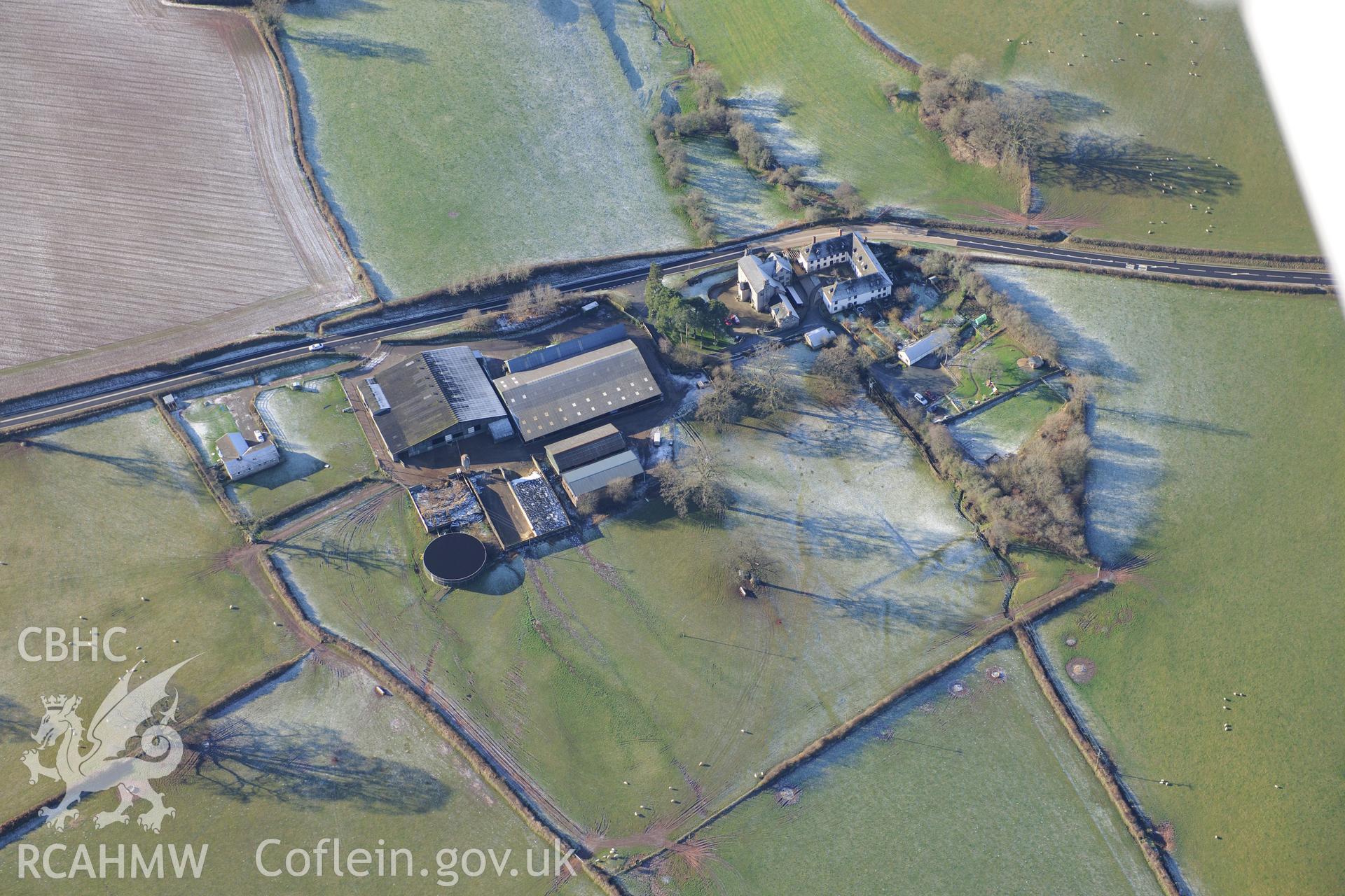 Trebarries mansion with its associated gardens and stable block, north west of Talgarth, Breconshire. Oblique aerial photograph taken during the Royal Commission?s programme of archaeological aerial reconnaissance by Toby Driver on 15th January 2013.