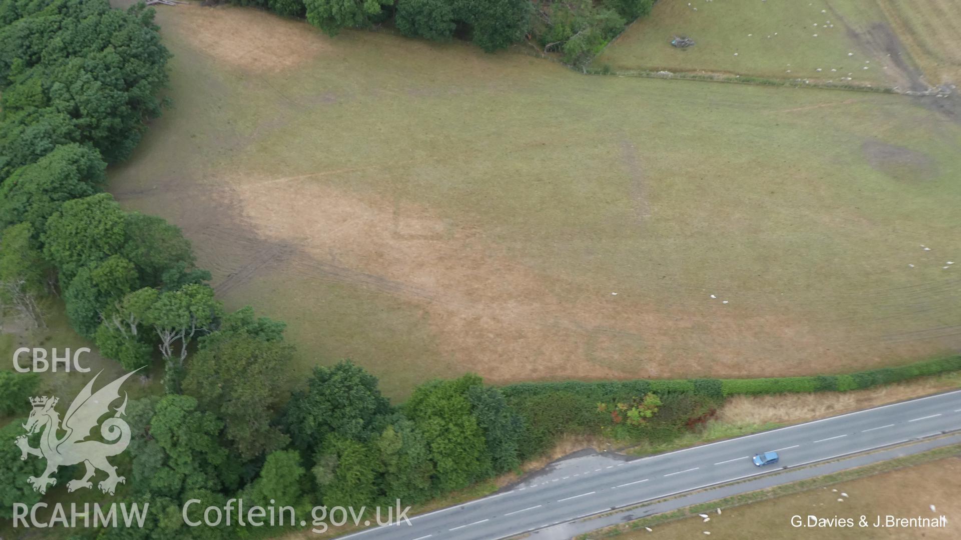 Aerial photograph of Square Barrow Cemetery, Croes Faen, taken by Glyn Davies & Jonathan Brentnall 15/07/2018 under drought conditions. This photograph is the original, for modified version which enhances visibility of the archaeology, see: BDC_04_01_05.