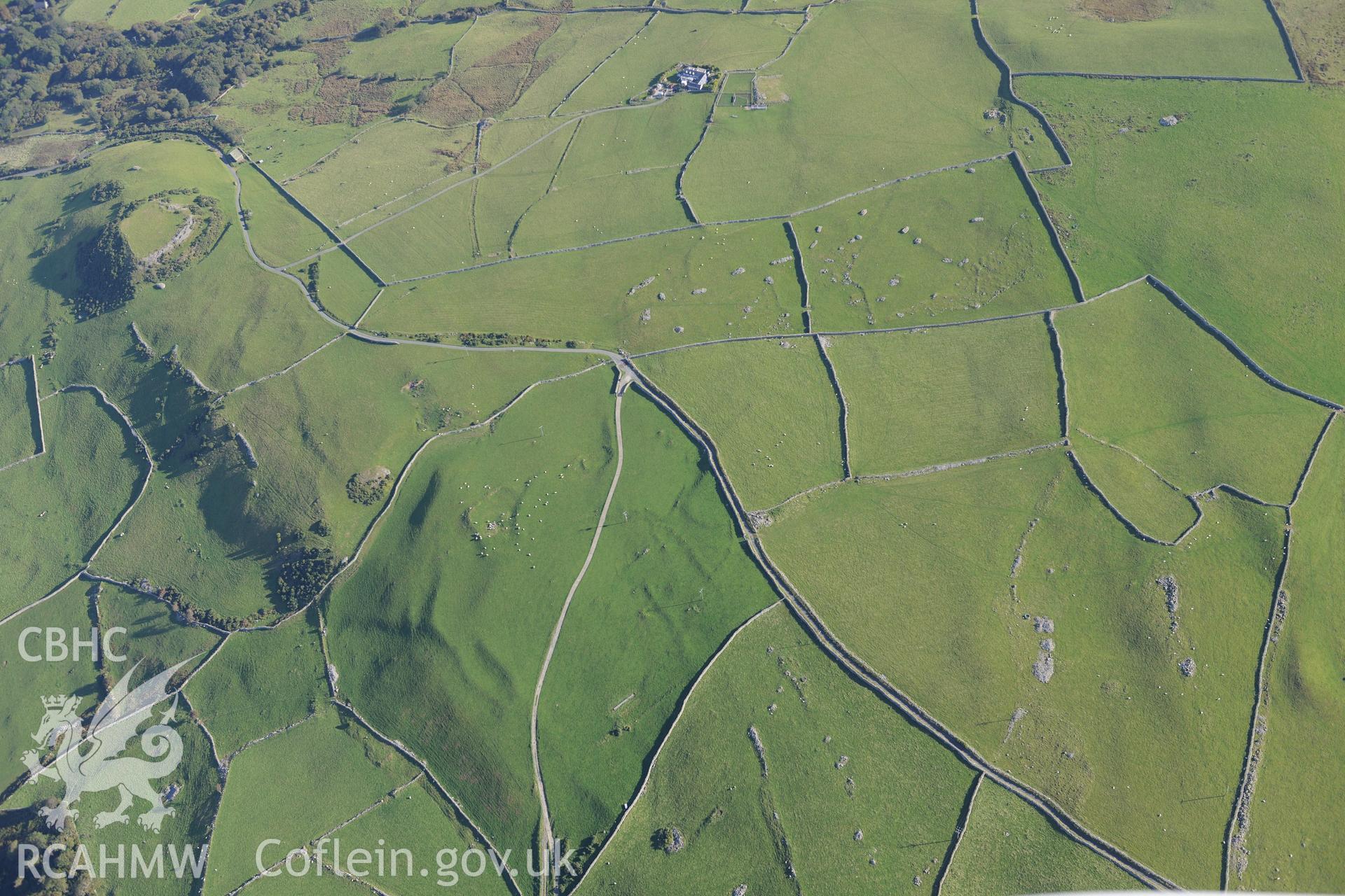 Castell y Gaer, the field system to the west of the Castell, and an enclosure north east of Carn-Gadell Uchaf. Oblique aerial photograph taken during the Royal Commission's programme of archaeological aerial reconnaissance by Toby Driver on 2nd October 2015.