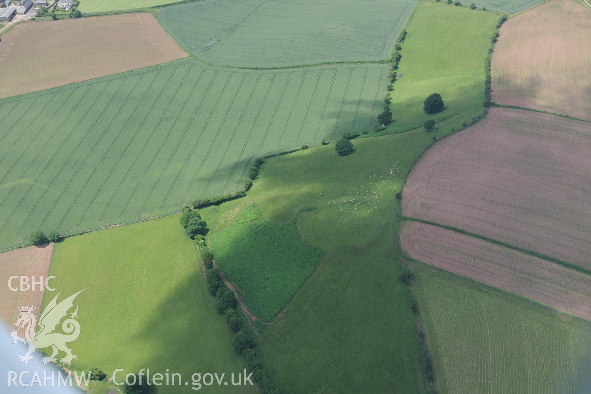 Ffynnon Gaer Hillfort, south of Monmouth. Oblique aerial photograph taken during the Royal Commission's programme of archaeological aerial reconnaissance by Toby Driver on 29th June 2015.