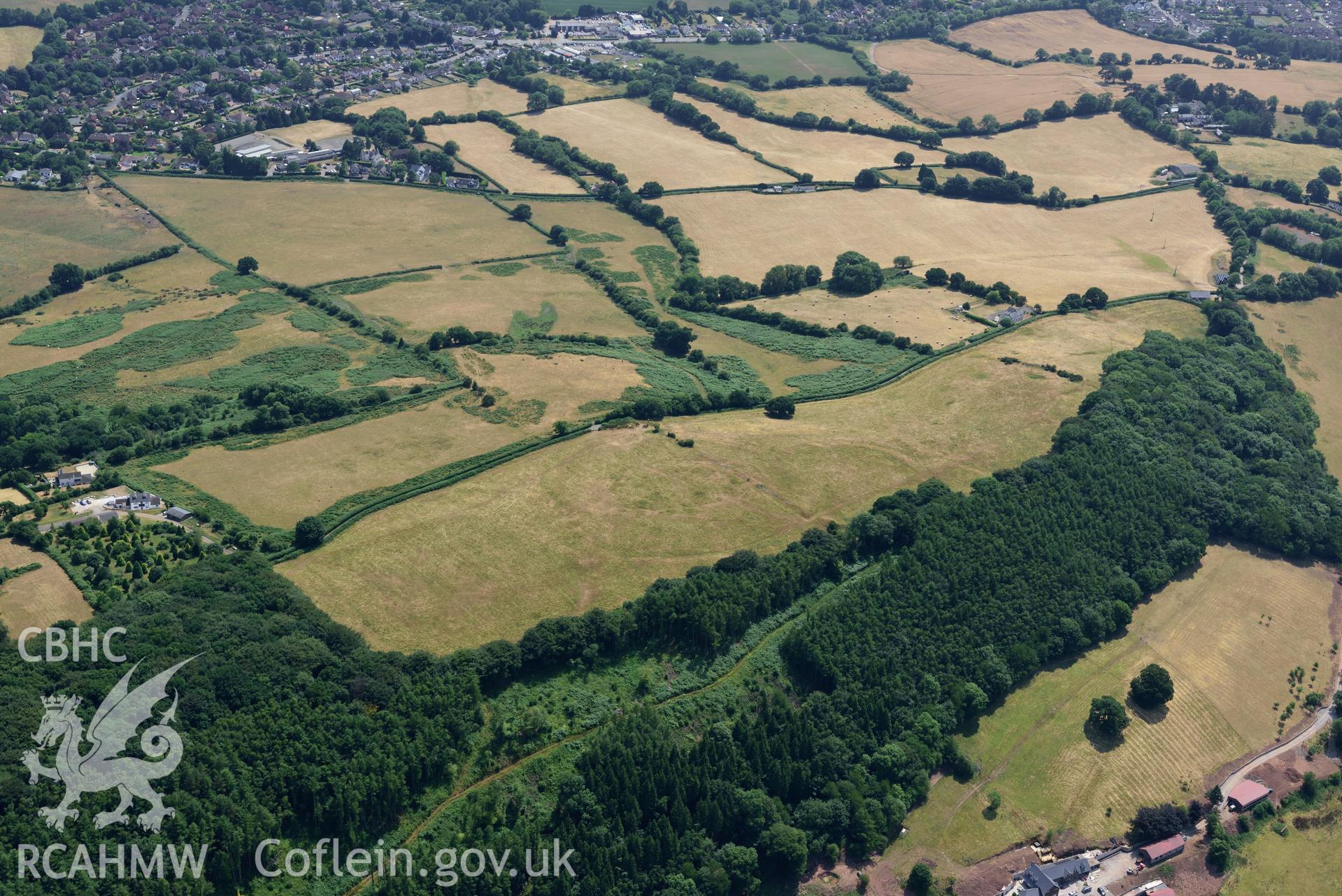 Royal Commission aerial photography of the Coed y Caerau enclosures taken on 19th July 2018 during the 2018 drought.