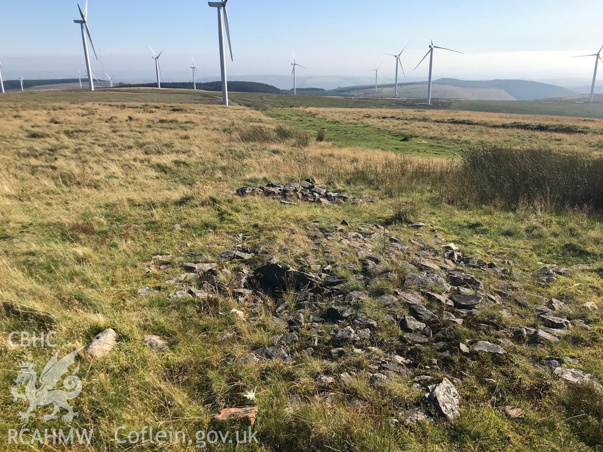 Digital colour photograph showing view of Garn Fawr cairn in Ogmore Valley, taken by Paul R. Davis on 25th August 2019.