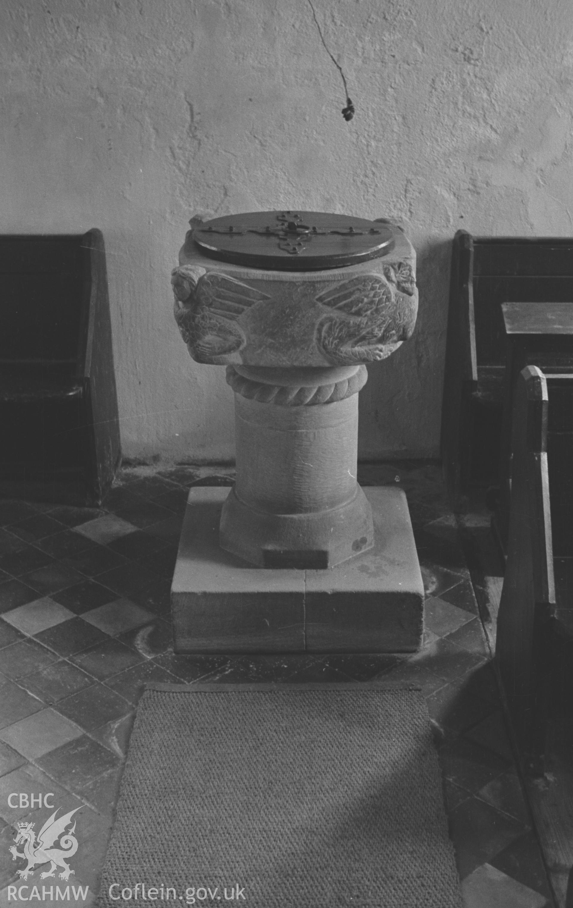 Digital copy of a black and white negative showing Norman font at St Mary's Church, Maestir, Lampter. Photographed in April 1963 by Arthur O. Chater from Grid Reference SN 5537 4932.