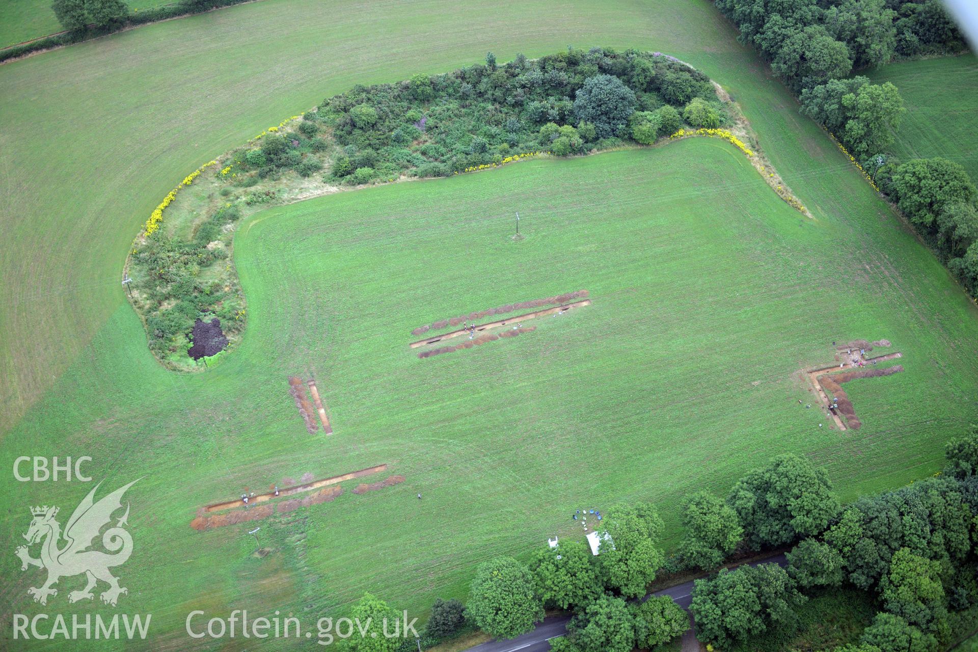 Wiston Roman Fort with excavations by Dyfed Archaeological Trust, north east of Haverfordwest. Oblique aerial photograph taken during the Royal Commission?s programme of archaeological aerial reconnaissance by Toby Driver on 1st August 2013.