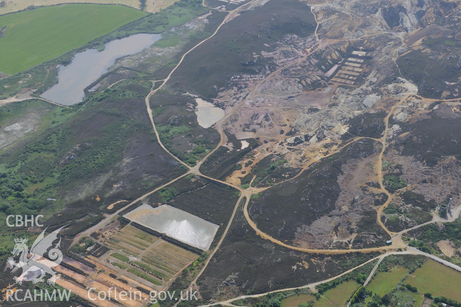 Parys Mountain copper mines, Amlwch, Anglesey. Oblique aerial photograph taken during the Royal Commission?s programme of archaeological aerial reconnaissance by Toby Driver on 12th July 2013.