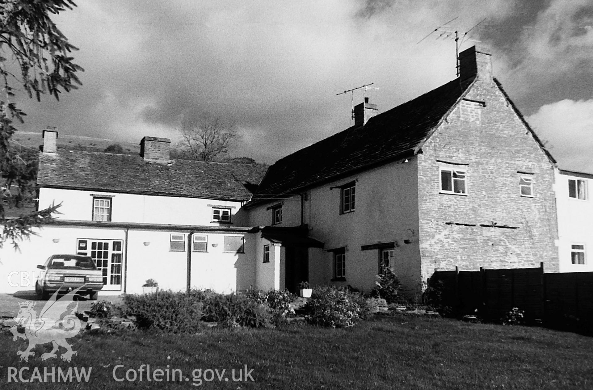 Digitised black and white photograph showing exterior view of Cross Keys Inn, Tretower taken by Paul Davis in 1990.