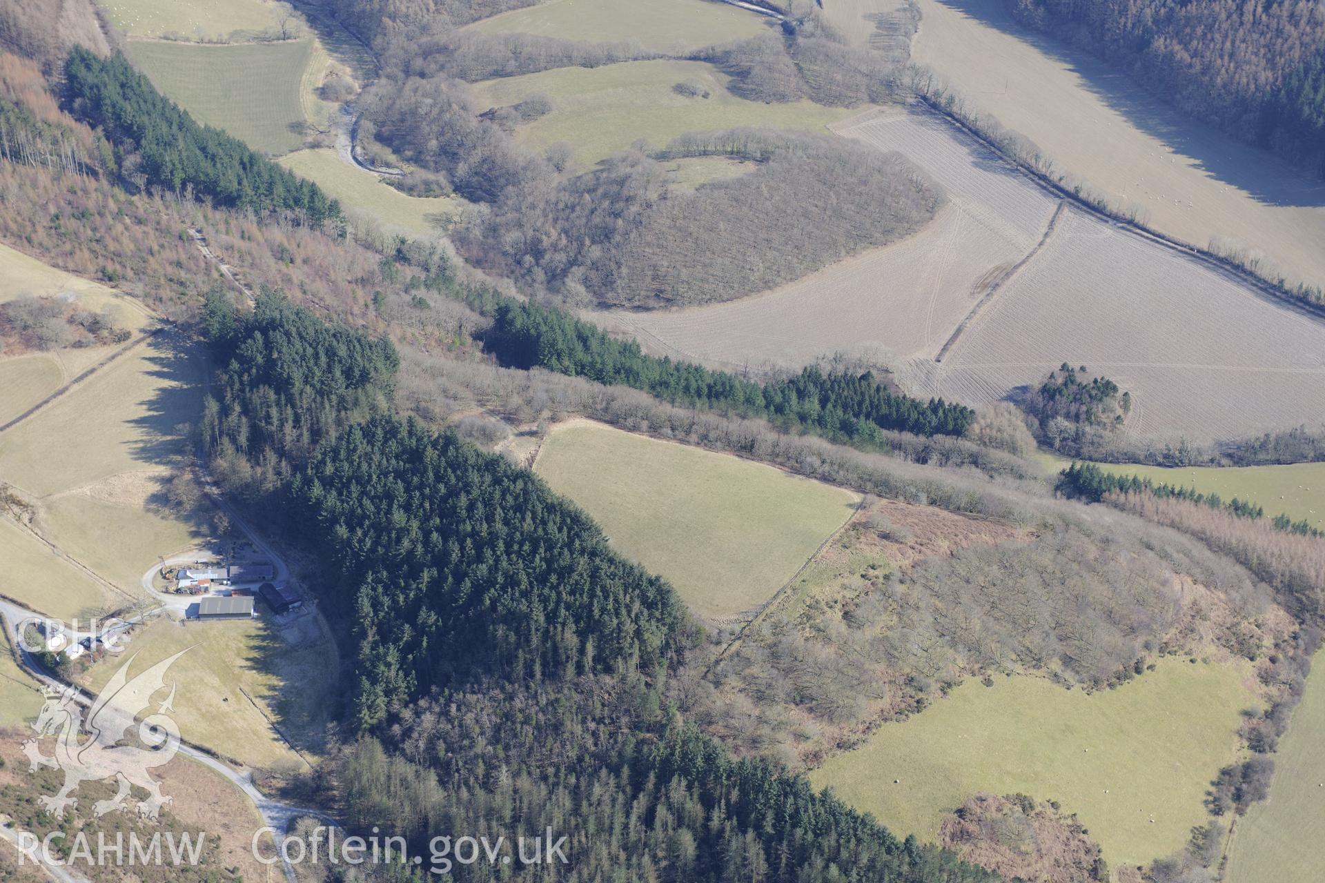 Banc y Castell hill fort, north east of Goginan, Aberystwyth. Oblique aerial photograph taken during the Royal Commission's programme of archaeological aerial reconnaissance by Toby Driver on 2nd April 2013.