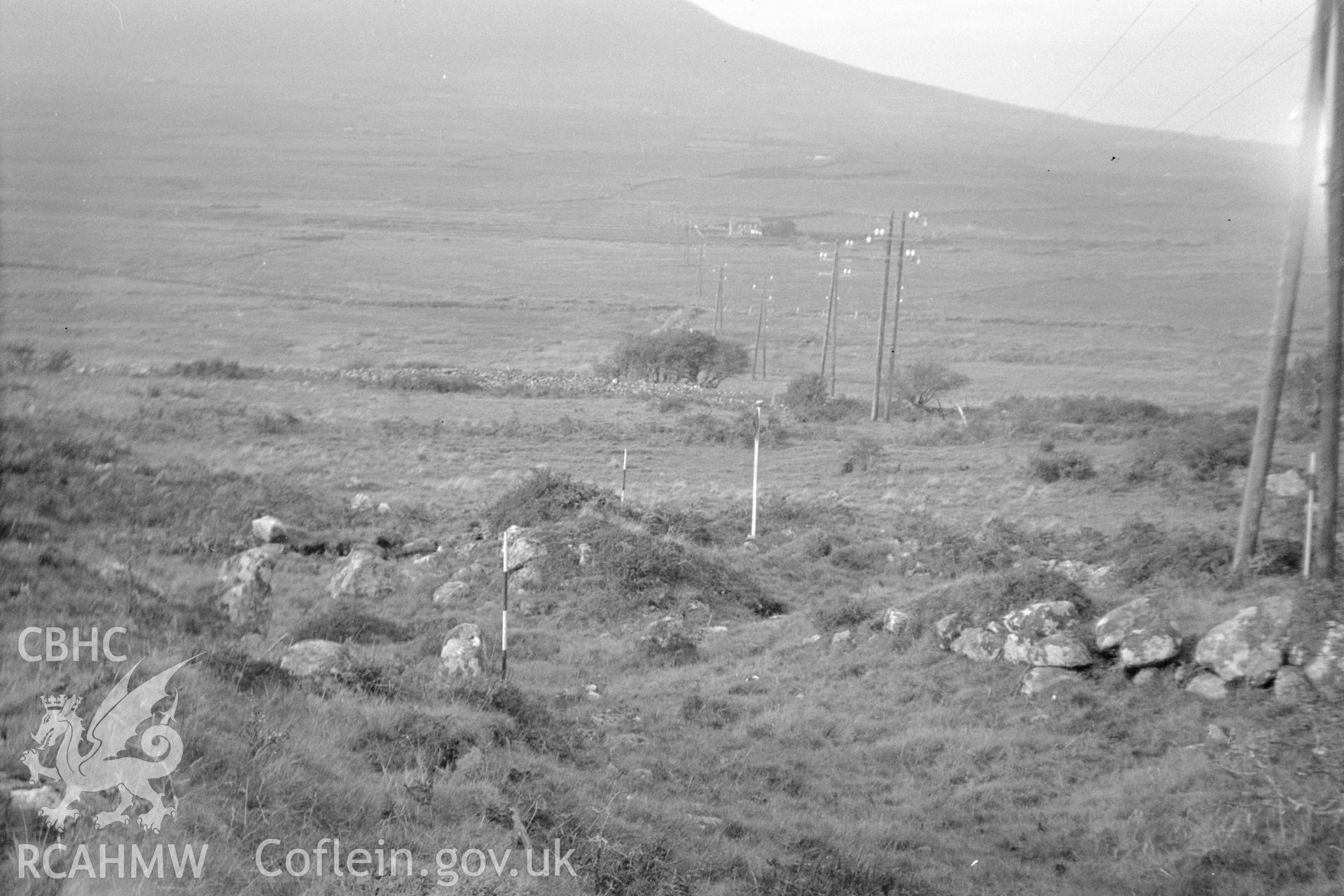 Digital copy of a nitrate negative showing Caerau ancient village. From the Cadw Monuments in Care Collection.