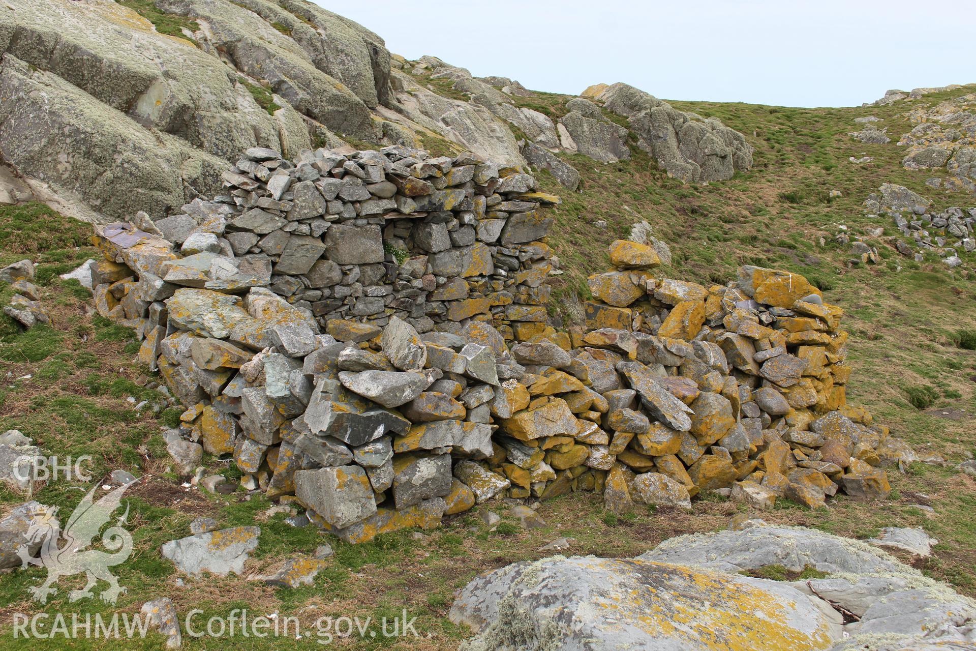 Skerries buoy keeper's cottage or stone shelter. Investigator's photographic survey for the CHERISH Project. ? Crown: CHERISH PROJECT 2018. Produced with EU funds through the Ireland Wales Co-operation Programme 2014-2020. All material made freely available through the Open Government Licence.