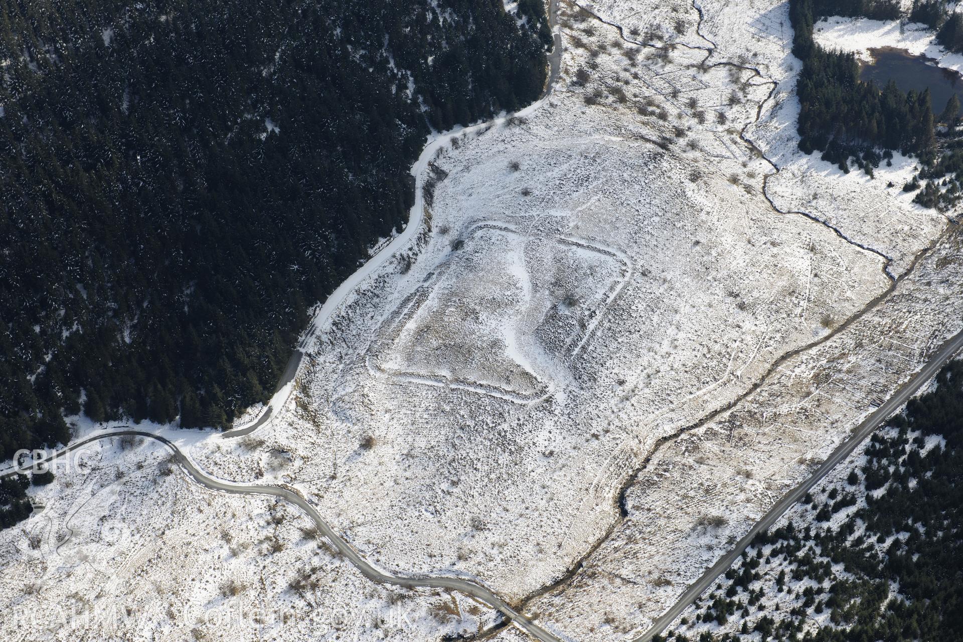 Cae Gaer Roman Fort, west of Llangurig. Oblique aerial photograph taken during the Royal Commission's programme of archaeological aerial reconnaissance by Toby Driver on 2nd April 2013.