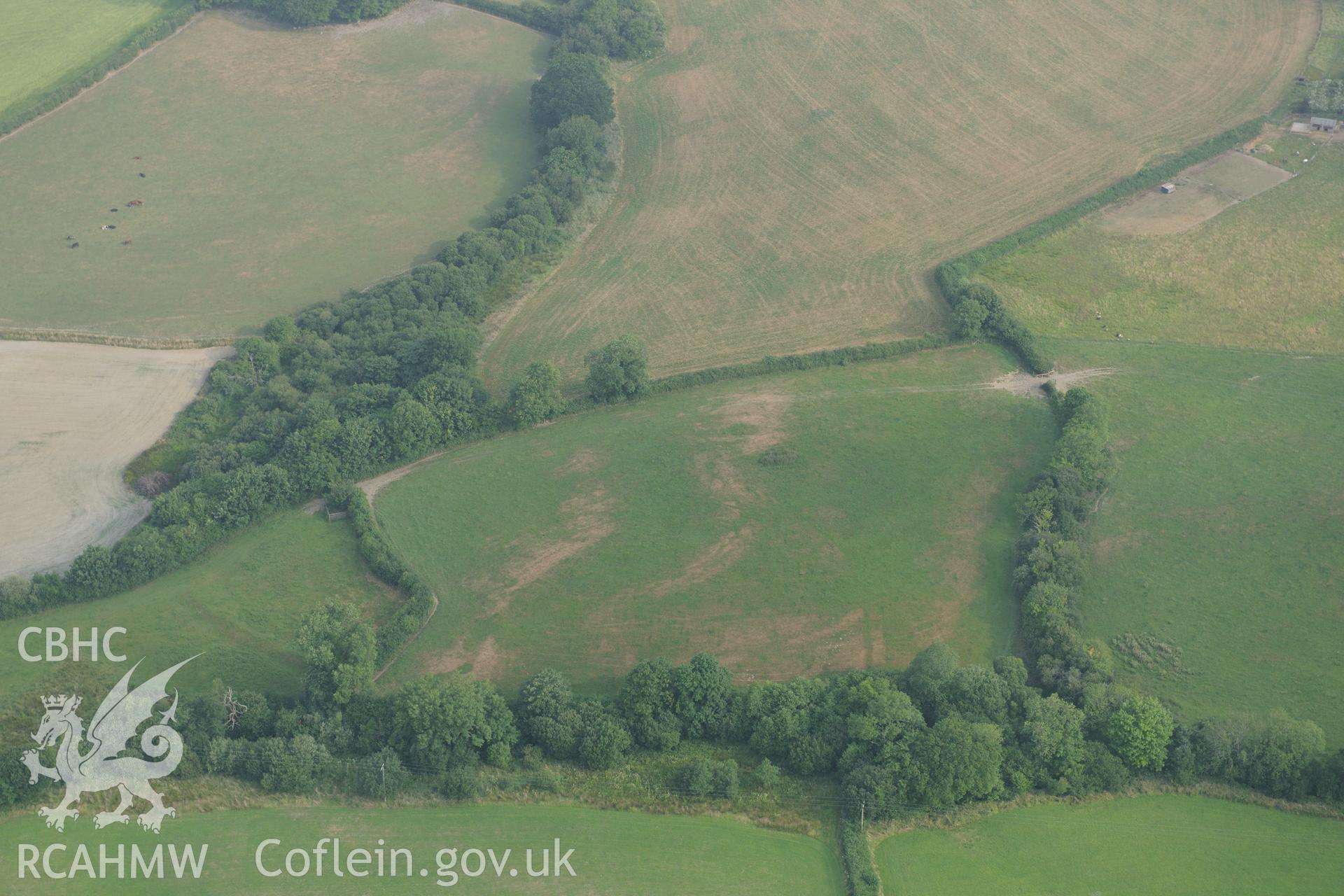 Royal Commission aerial photography of Llangan Church recorded during drought conditions on 22nd July 2013.