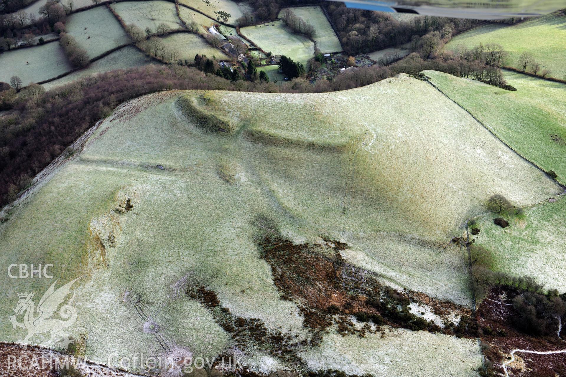 Y Fan hillfort, Llansadwrn, south west of Llandovery. Oblique aerial photograph taken during the Royal Commission?s programme of archaeological aerial reconnaissance by Toby Driver on 15th January 2013.