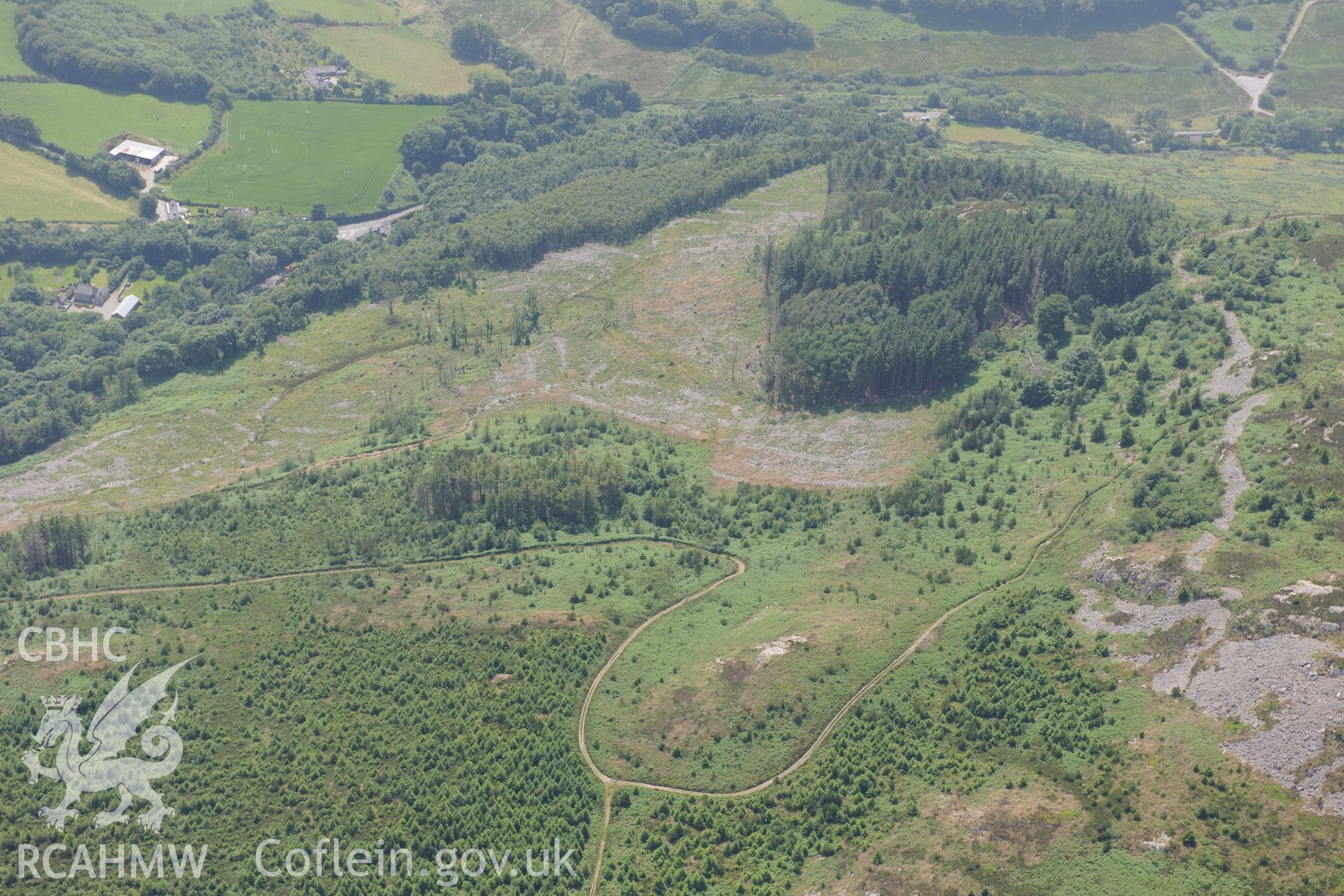 Garn Boduan hillfort, Nefyn, on the Lleyn Peninsula. Oblique aerial photograph taken during the Royal Commission?s programme of archaeological aerial reconnaissance by Toby Driver on 12th July 2013.