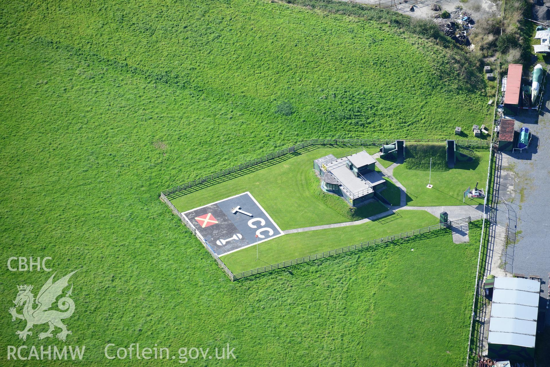 Carew Cheriton Control Tower at Carew Cheriton airfield, east of Pembroke Dock. Oblique aerial photograph taken during the Royal Commission's programme of archaeological aerial reconnaissance by Toby Driver on 30th September 2015.