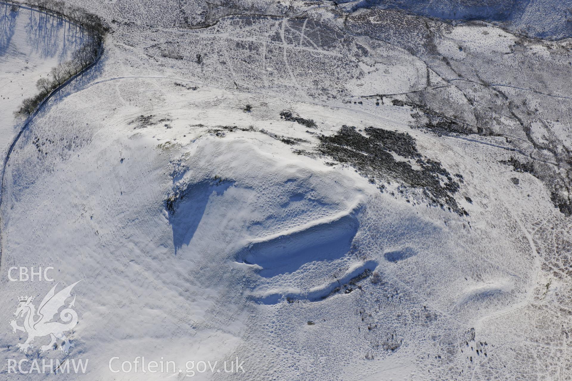 Cwm Berwyn defended enclosure, north east of Builth Wells. Oblique aerial photograph taken during the Royal Commission?s programme of archaeological aerial reconnaissance by Toby Driver on 15th January 2013.