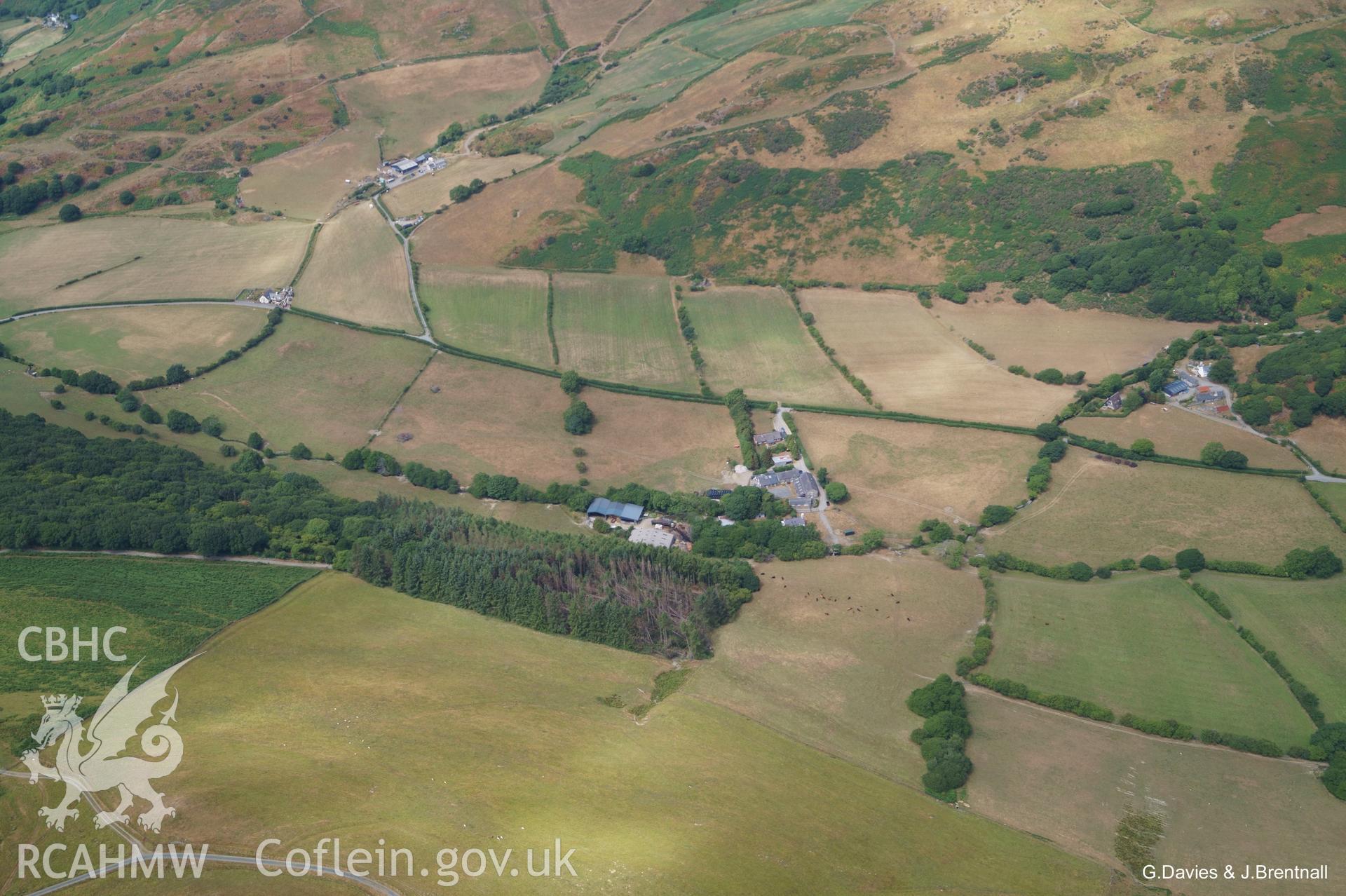 Aerial photograph of a ring ditch cropmark at Dyffryn Gwyn Farm taken by Glyn Davies and Jonathan Brentnall on 17th July 2019, under drought conditions. Photograph modified & archaeological features highlighted. Original photograph: BDC_03_01_02.