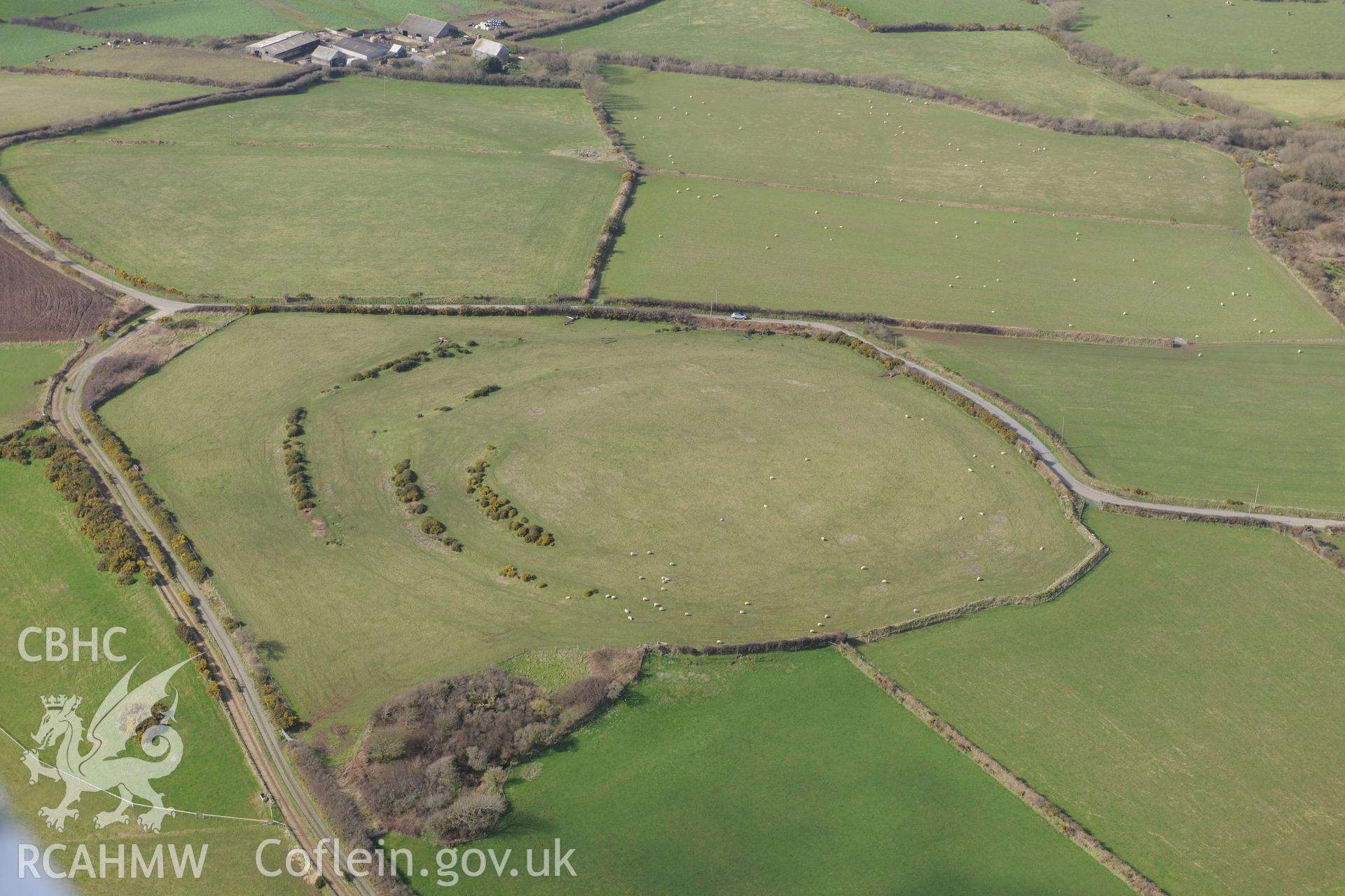 Caerau Gaer defended enclosure, Moylgrove, near Cardigan. Oblique aerial photograph taken during the Royal Commission's programme of archaeological aerial reconnaissance by Toby Driver on 13th March 2015.