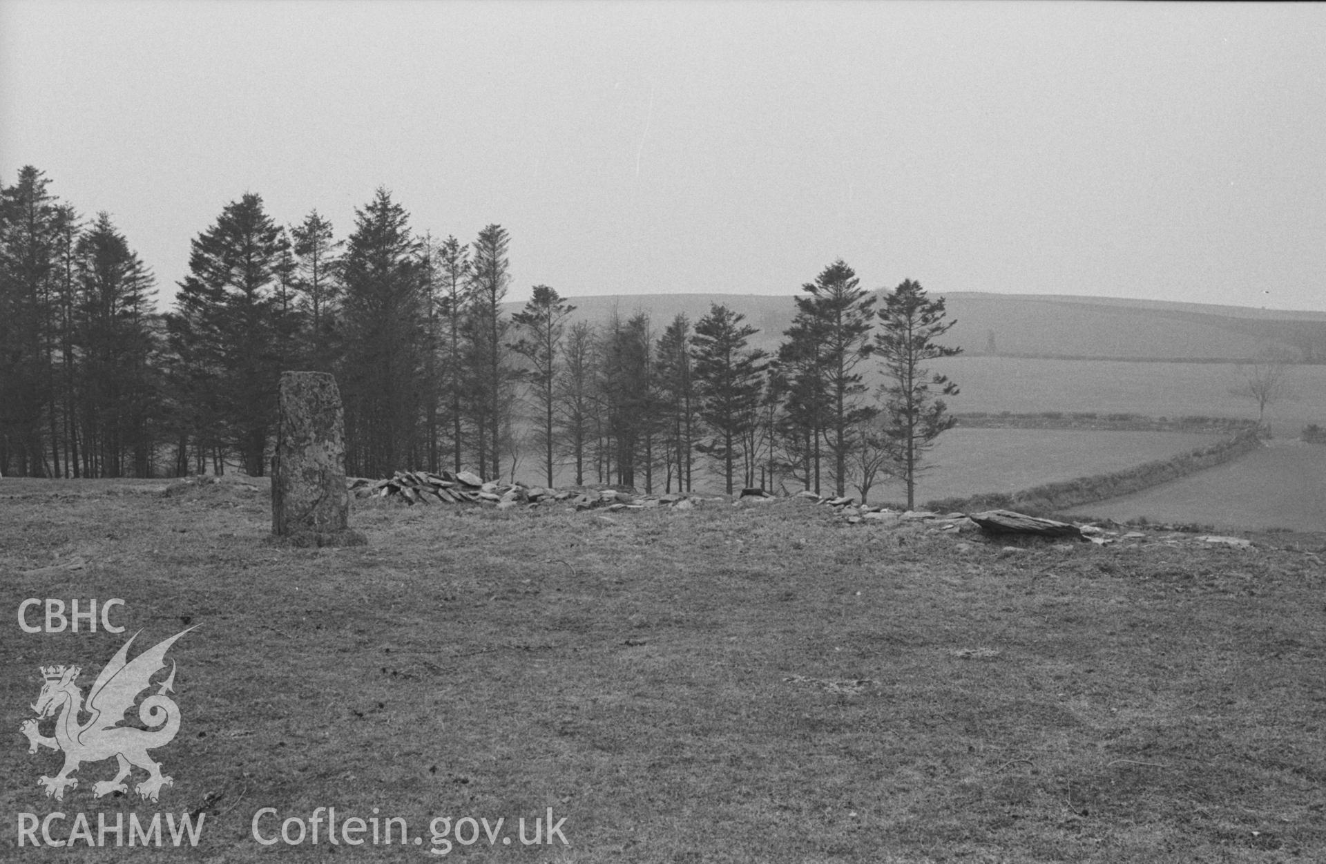 Digital copy of a black and white negative showing view of Carreg Hirfaen, Llanycrwys, defining the border between Ceredigion and Carmarthenshire. Photographed in April 1963 by Arthur O. Chater.