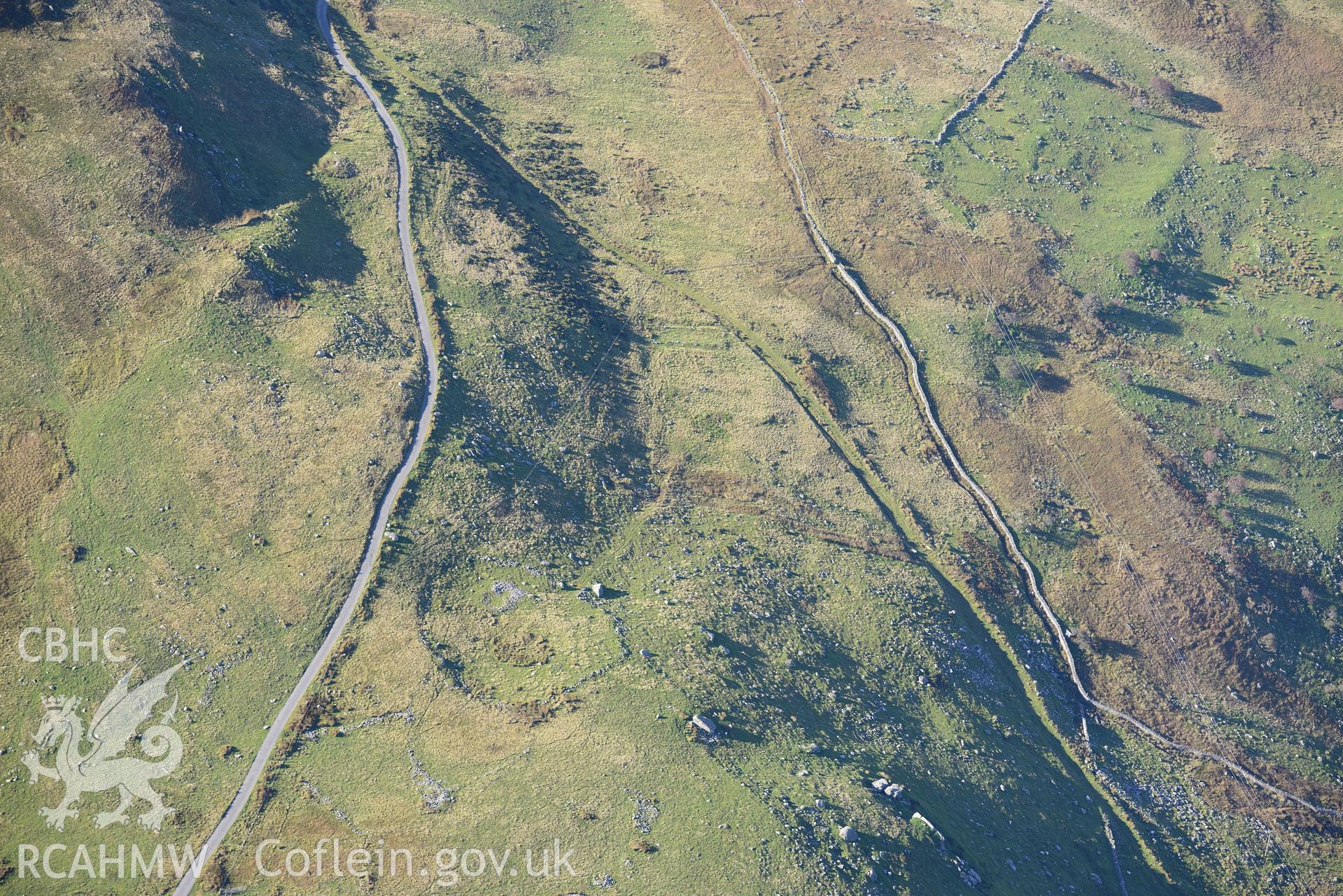 Bryn Seward settlement, south east of Fairbourne. Oblique aerial photograph taken during the Royal Commission's programme of archaeological aerial reconnaissance by Toby Driver on 2nd October 2015.