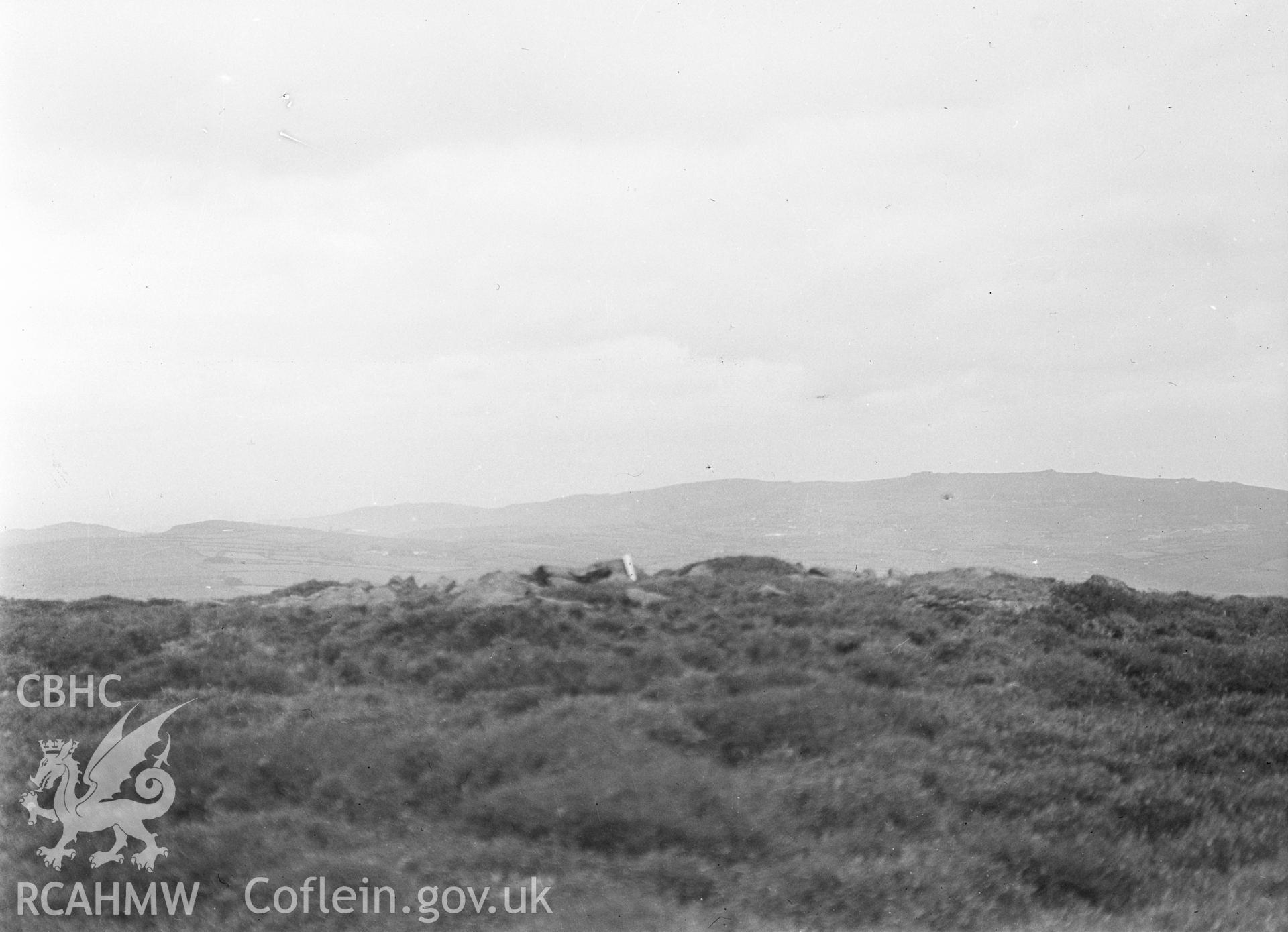 Digital copy of a nitrate negative showing Corndon Hill Cairns. From Cadw Monuments in Care  Collection.