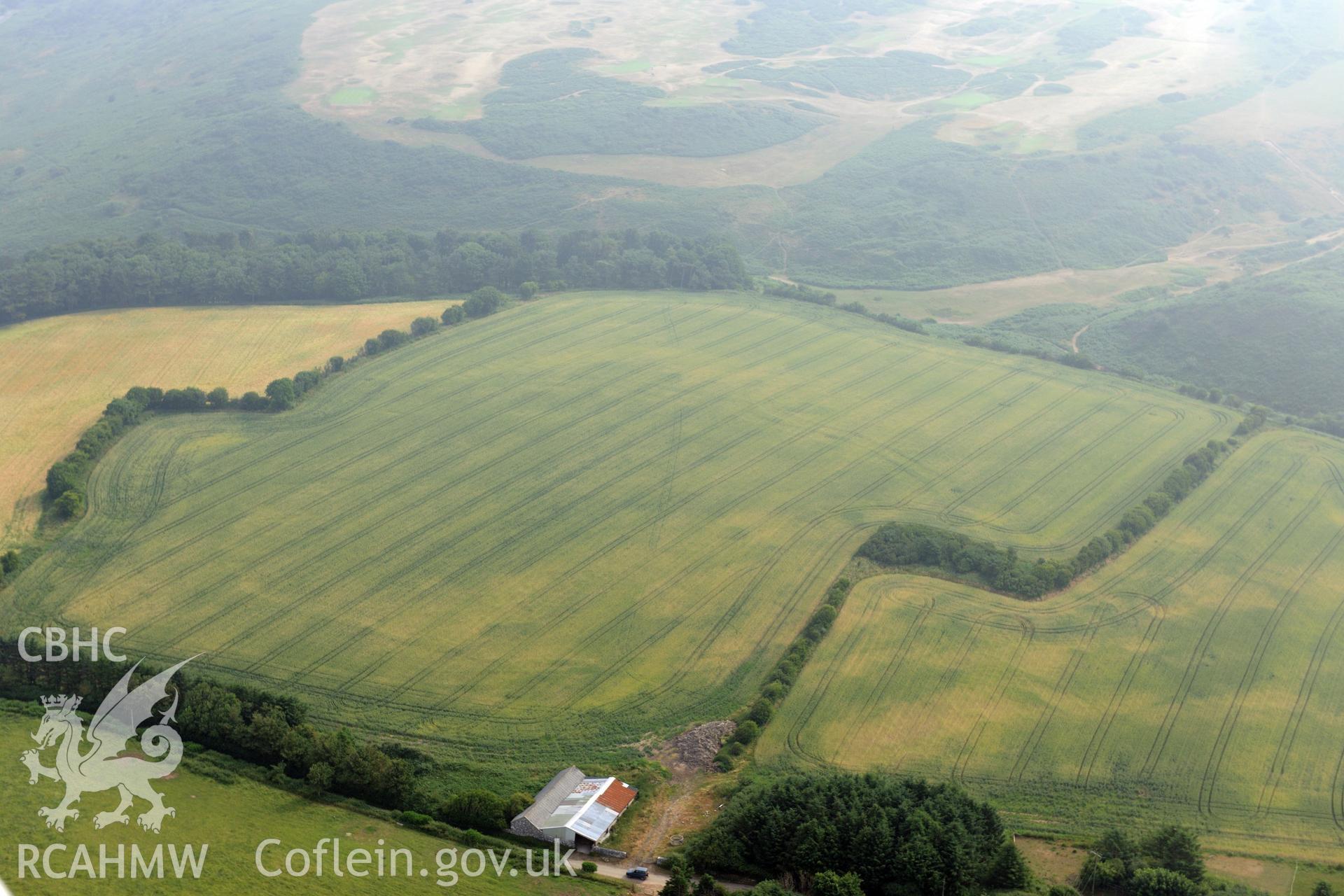 Royal Commission aerial photography of Norton causewayed enclosure cropmarks recorded during drought conditions on 22nd July 2013.