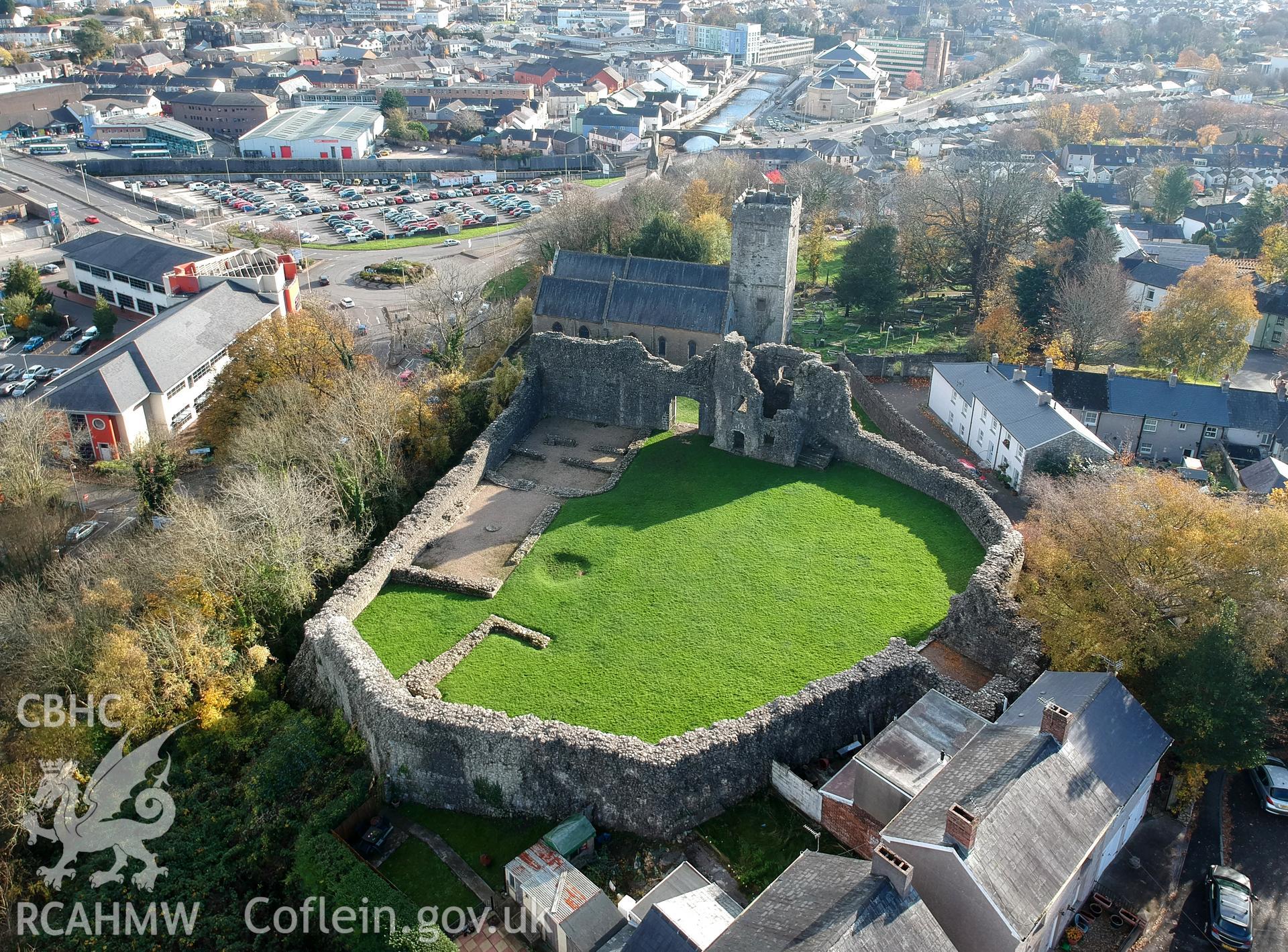 View from the north west of Newcastle castle and St. Illtyd's church beyond, Bridgend. Colour photograph taken by Paul R. Davis on 14th November 2018.