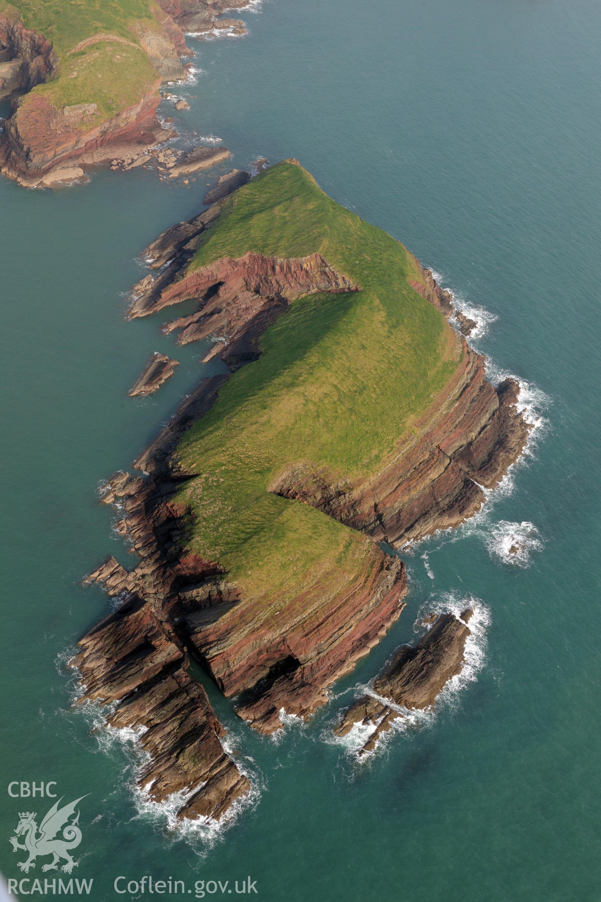 Royal Commission aerial photograph of Sheep Island taken on 27th March 2017. Baseline aerial reconnaissance survey for the CHERISH Project. ? Crown: CHERISH PROJECT 2019. Produced with EU funds through the Ireland Wales Co-operation Programme 2014-2020. All material made freely available through the Open Government Licence.