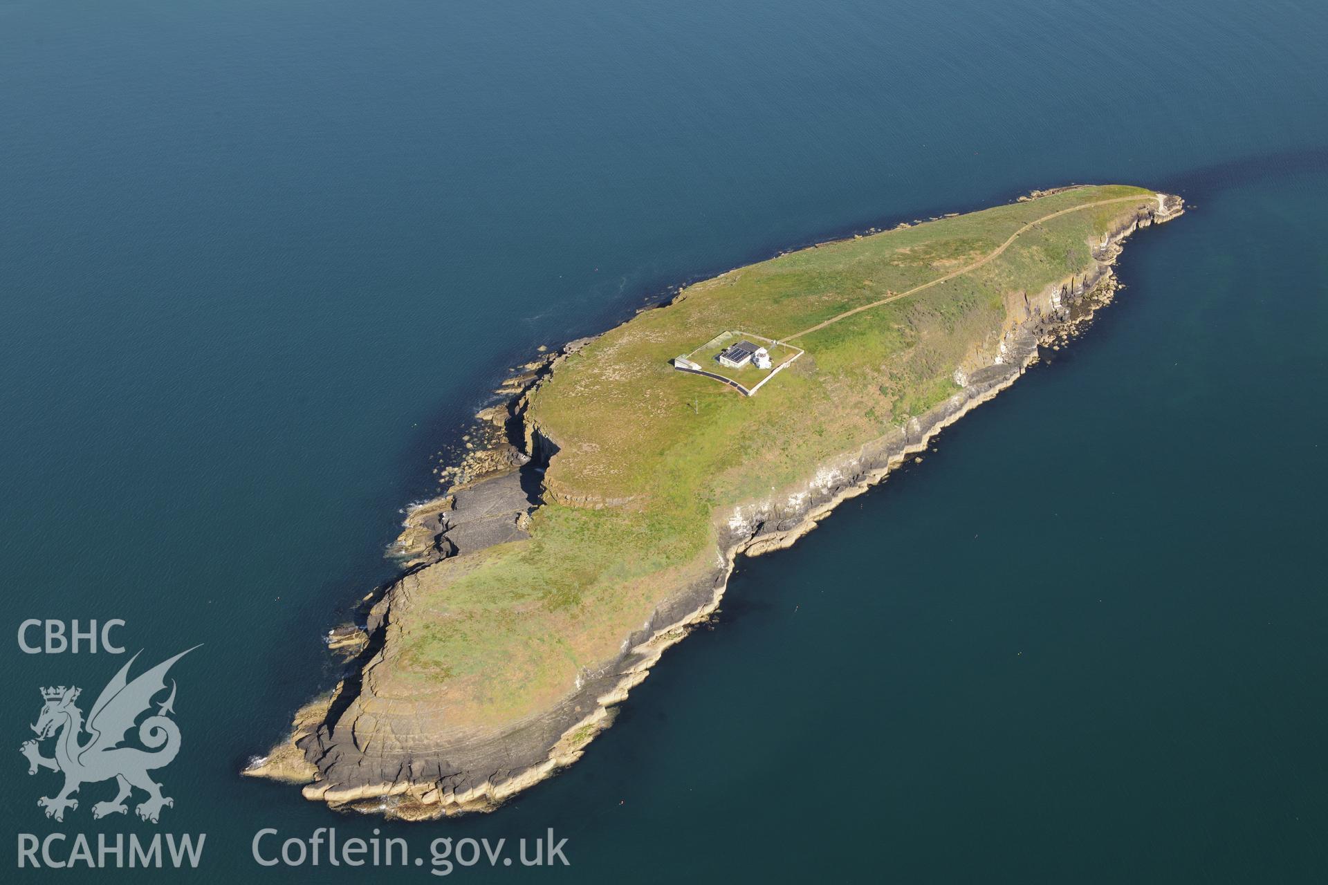 St Tudwal's Island West and its lighthouse. Oblique aerial photograph taken during the Royal Commission's programme of archaeological aerial reconnaissance by Toby Driver on 23rd June 2015.