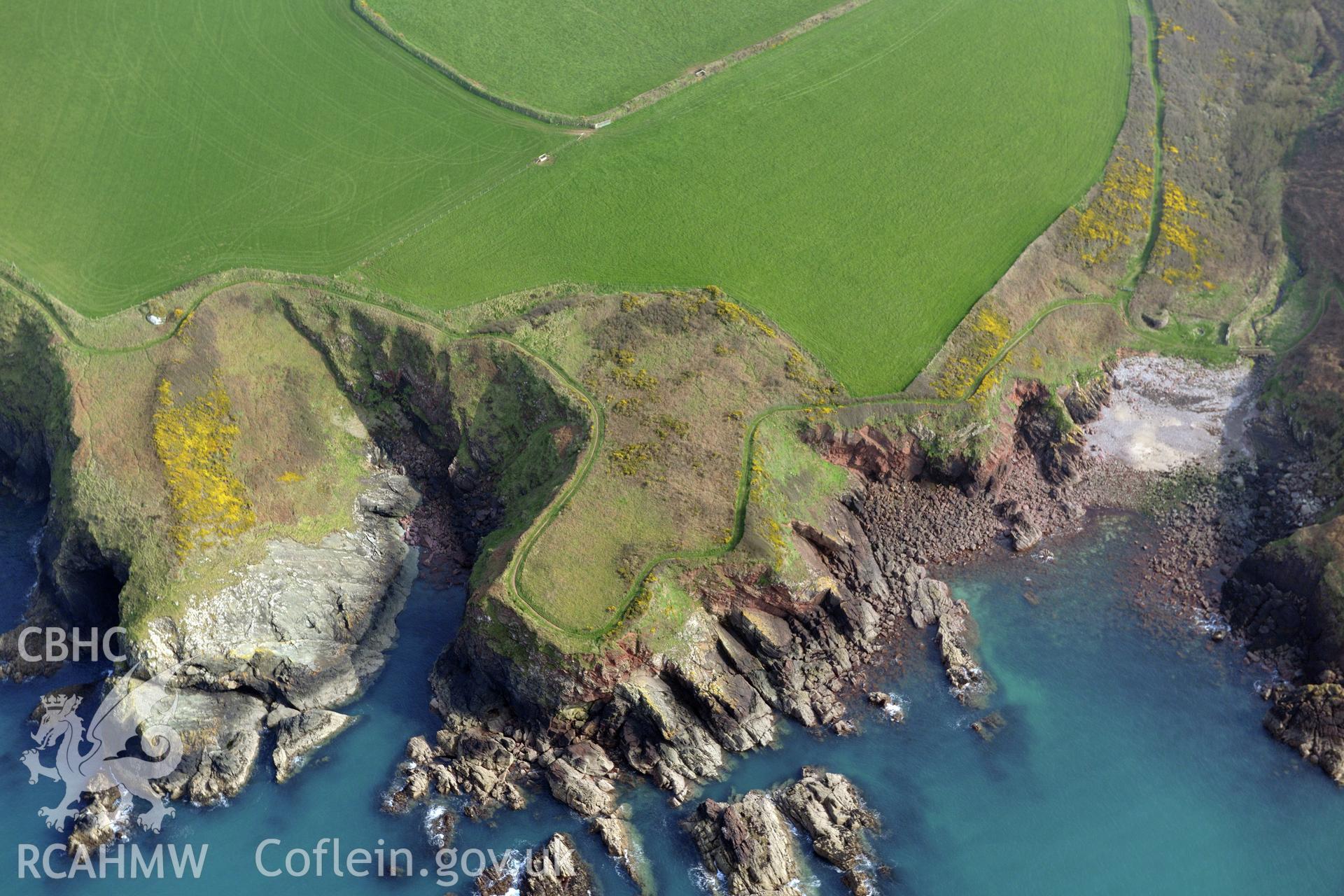 Aerial photography of Castle Head promontory fort taken on 27th March 2017. Baseline aerial reconnaissance survey for the CHERISH Project. ? Crown: CHERISH PROJECT 2017. Produced with EU funds through the Ireland Wales Co-operation Programme 2014-2020. All material made freely available through the Open Government Licence.