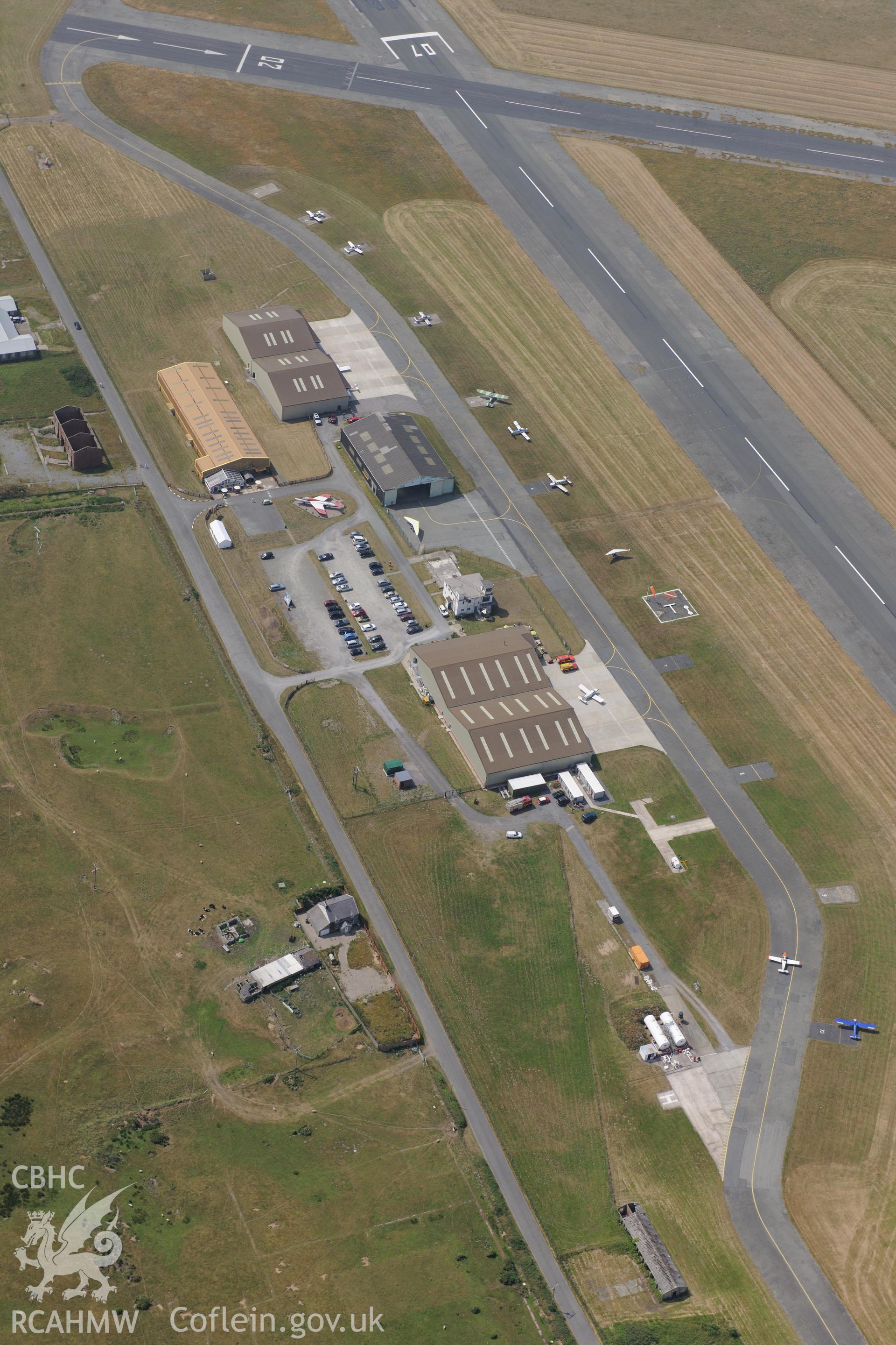 Caernarfon airfield, Llandwrog. Oblique aerial photograph taken during the Royal Commission?s programme of archaeological aerial reconnaissance by Toby Driver on 12th July 2013.