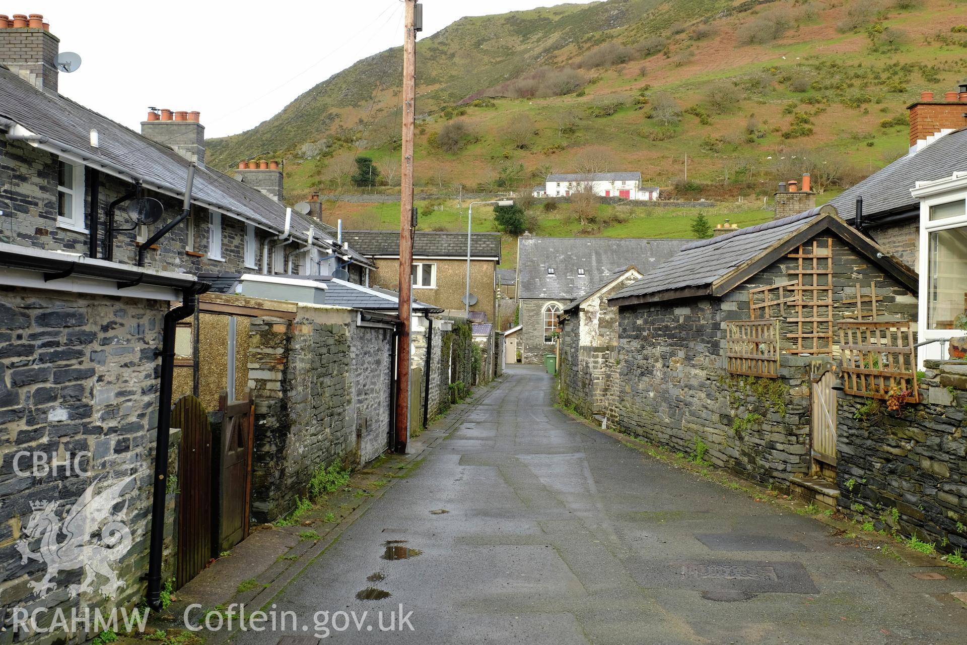 Colour photograph showing view looking north at alleyway (former tramroad) between Heol y Dwr and Heol Llanegryn, Abergynolwyn, produced by Richard Hayman 7th February 2017