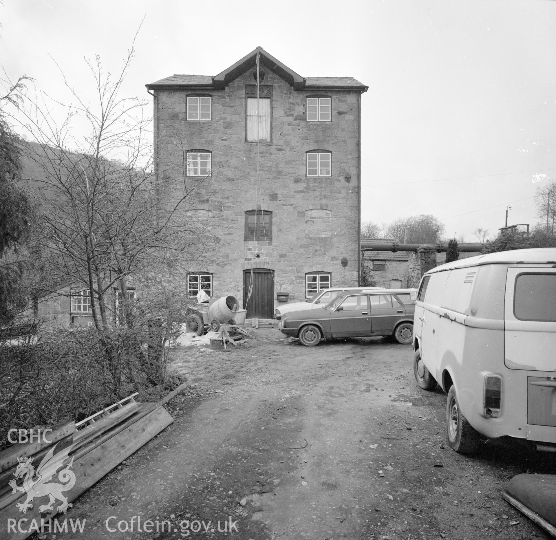 Digital copy of a black and white negative showing exterior view of Trevor Old Mill taken by RCAHMW, 1987.