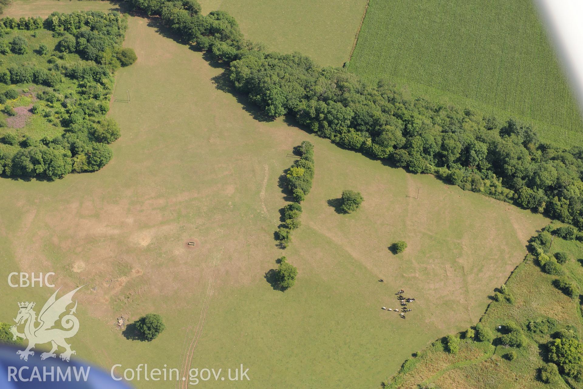 Building complex south east of Runston, south west of Chepstow. Oblique aerial photograph taken during the Royal Commission?s programme of archaeological aerial reconnaissance by Toby Driver on 1st August 2013.