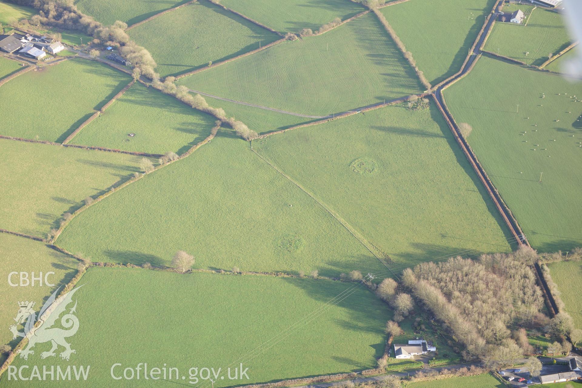 Blaennantrhyd Cairns I - III and the Blaennantrhys Stone. Oblique aerial photograph taken during the Royal Commission's programme of archaeological aerial reconnaissance by Toby Driver on 6th January 2015.