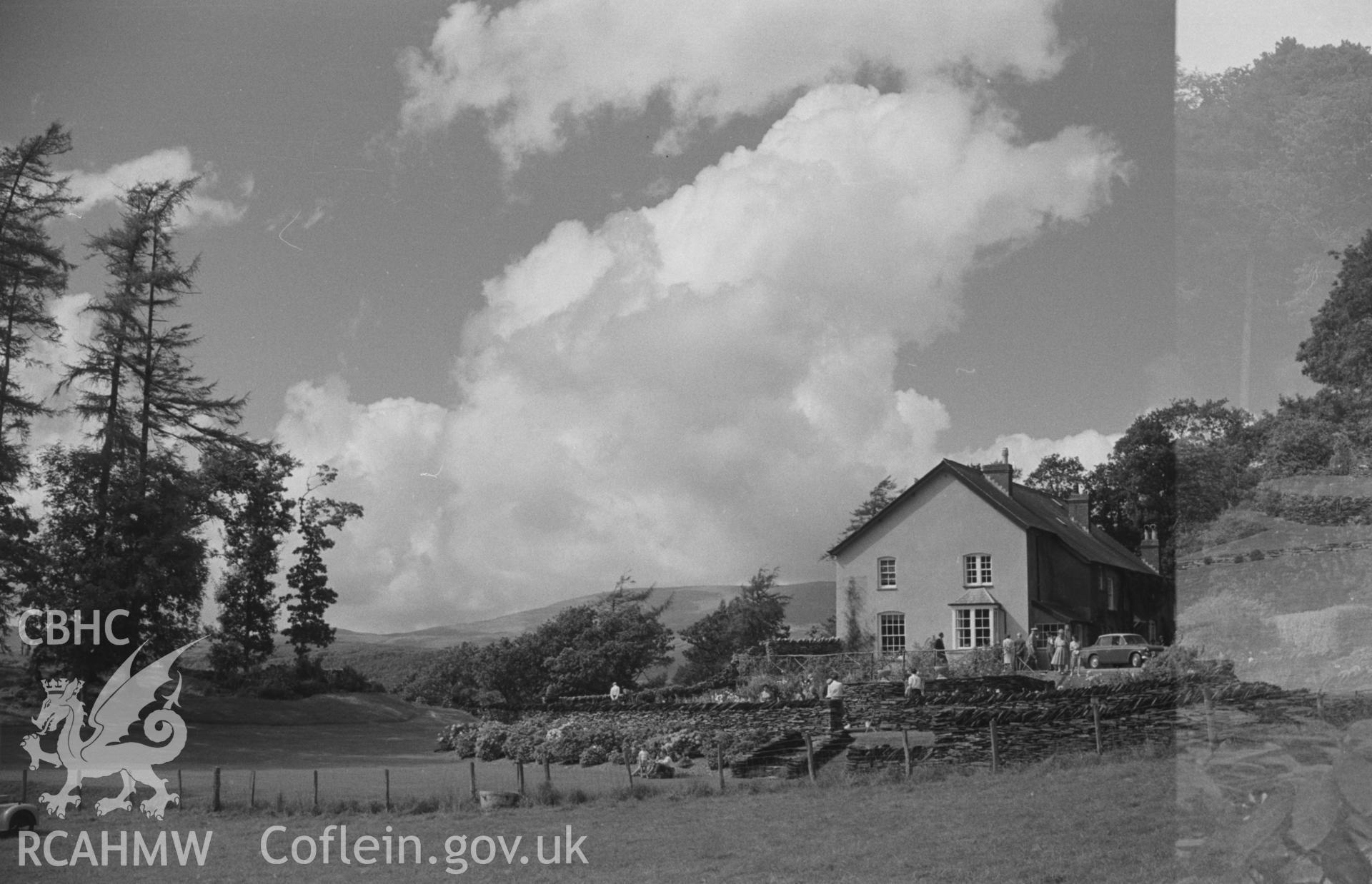 Digital copy of a black and white negative showing Cymerau farmhouse and garden, Eglwysfach, near Machynlleth. Photographed by Arthur O. Chater in August 1965.