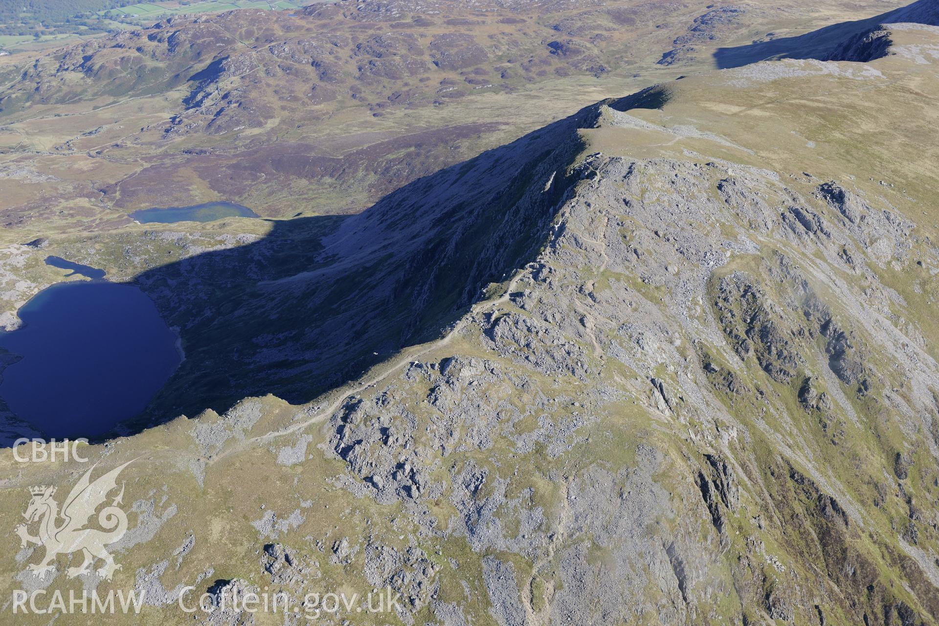 Penygadair - the summit of Cadair Idris. Oblique aerial photograph taken during the Royal Commission's programme of archaeological aerial reconnaissance by Toby Driver on 2nd October 2015.