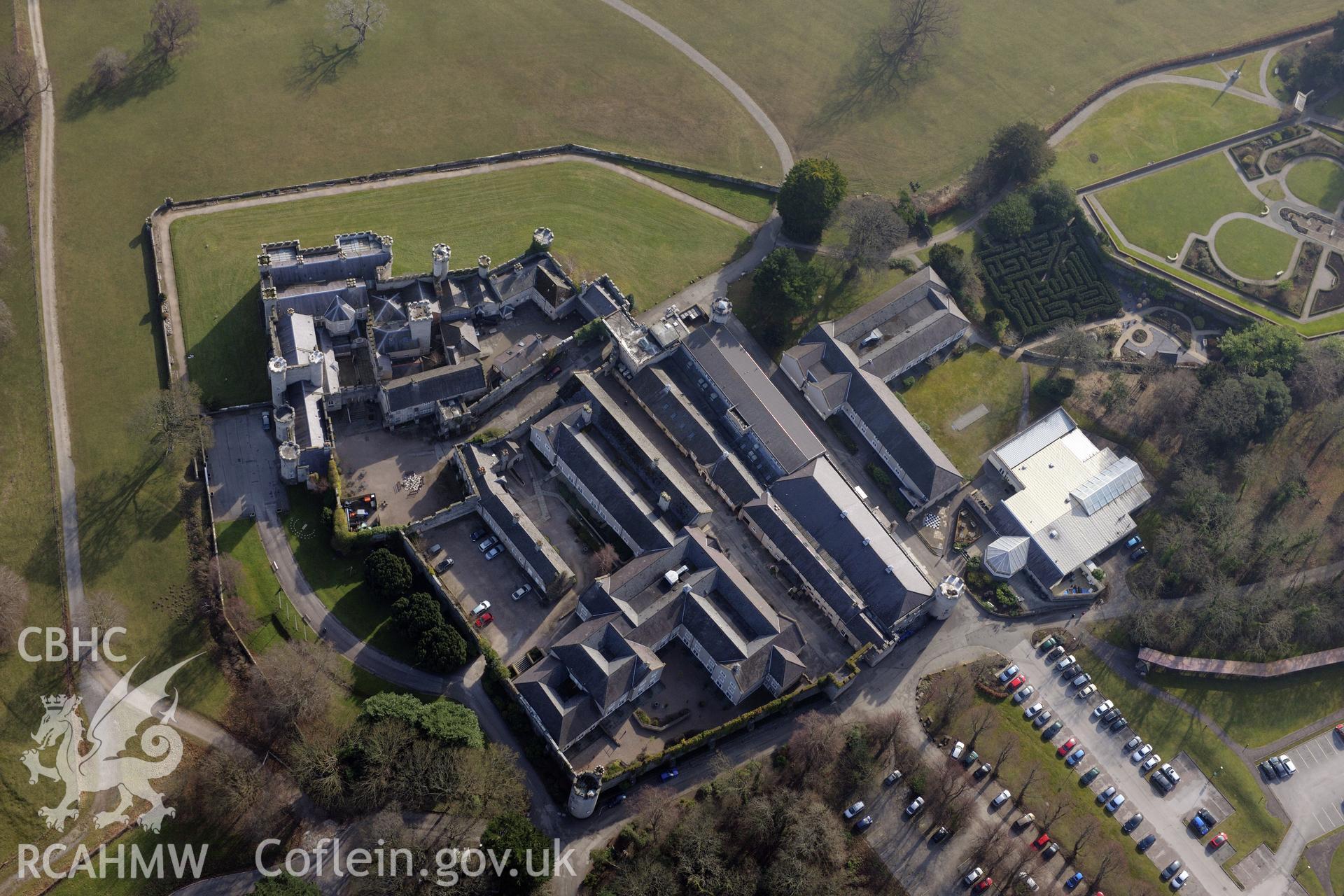 Bodelwyddan Castle and its garden, west of St. Asaph. Oblique aerial photograph taken during the Royal Commission?s programme of archaeological aerial reconnaissance by Toby Driver on 28th February 2013.