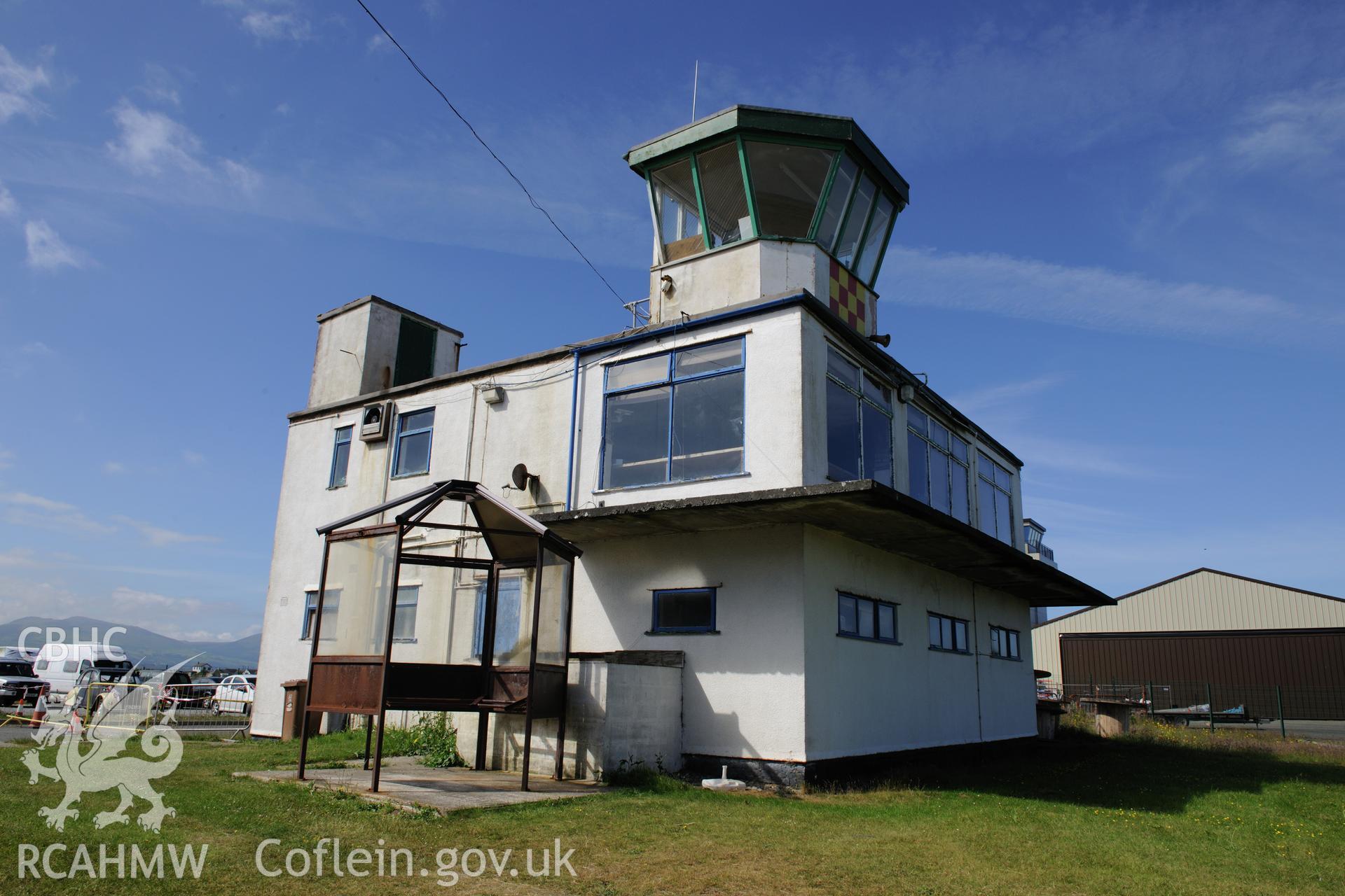 Caernarfon control tower at RAF Llandwrog, shortly before demolition. Oblique aerial photograph taken during the Royal Commission's programme of archaeological aerial reconnaissance by Toby Driver on 23rd June 2015.