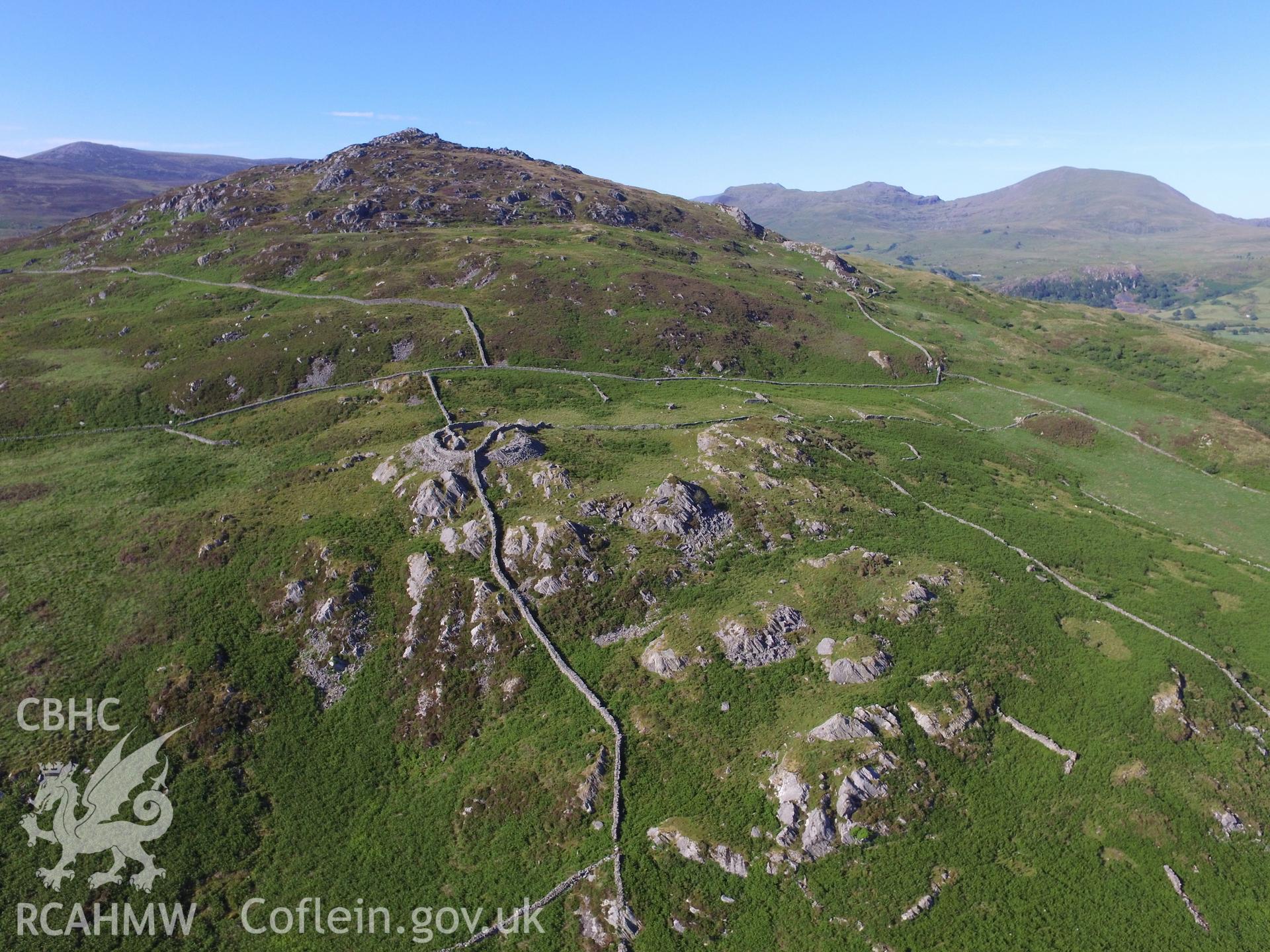 Aerial view of the remains of Castell Caerau, Dolbenmaen. Colour photograph taken by Paul R. Davis on 22nd June 2018.