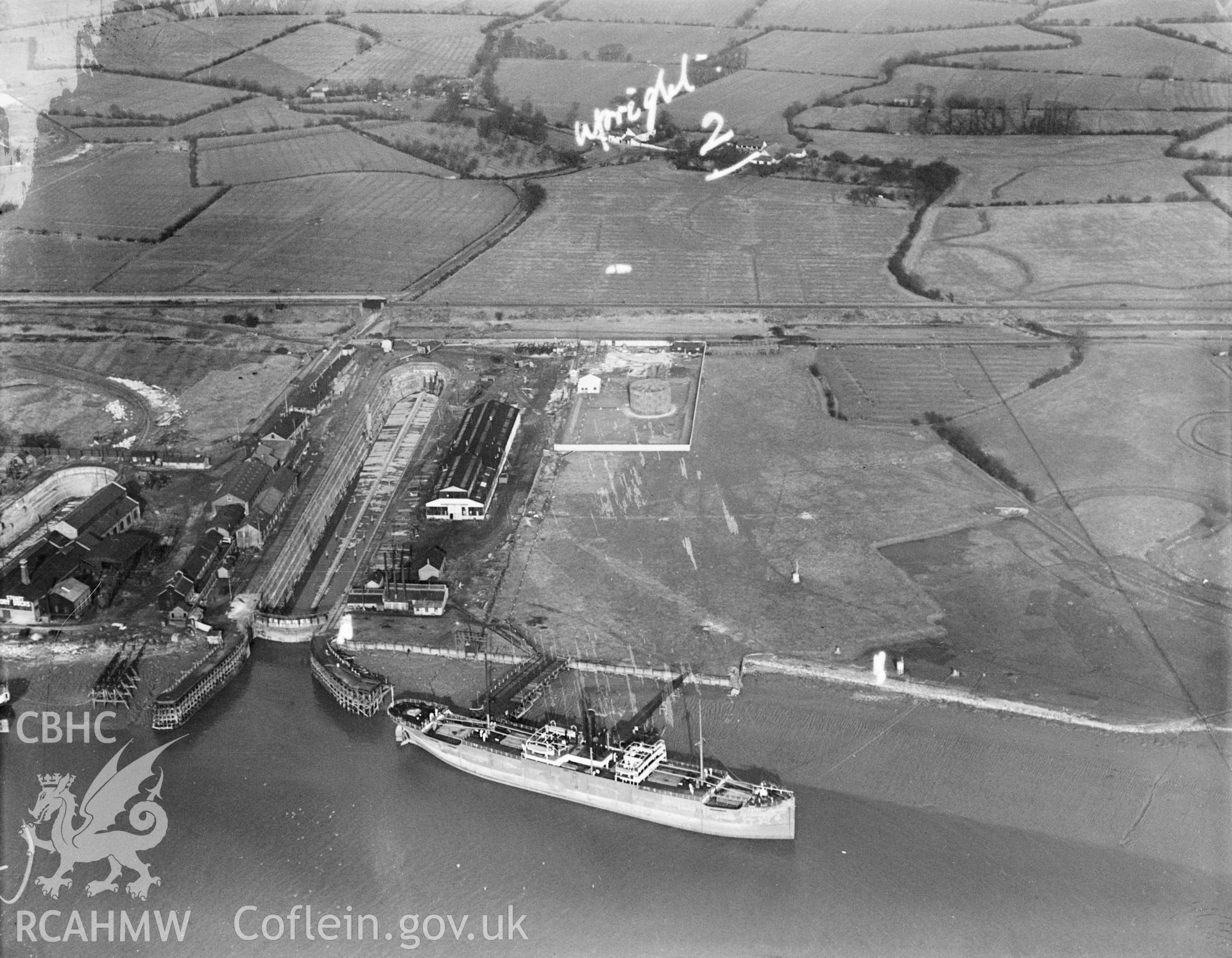 View of British Oil Storage Co., Union Dry Dock, Newport, oblique aerial view. 5?x4? black and white glass plate negative.