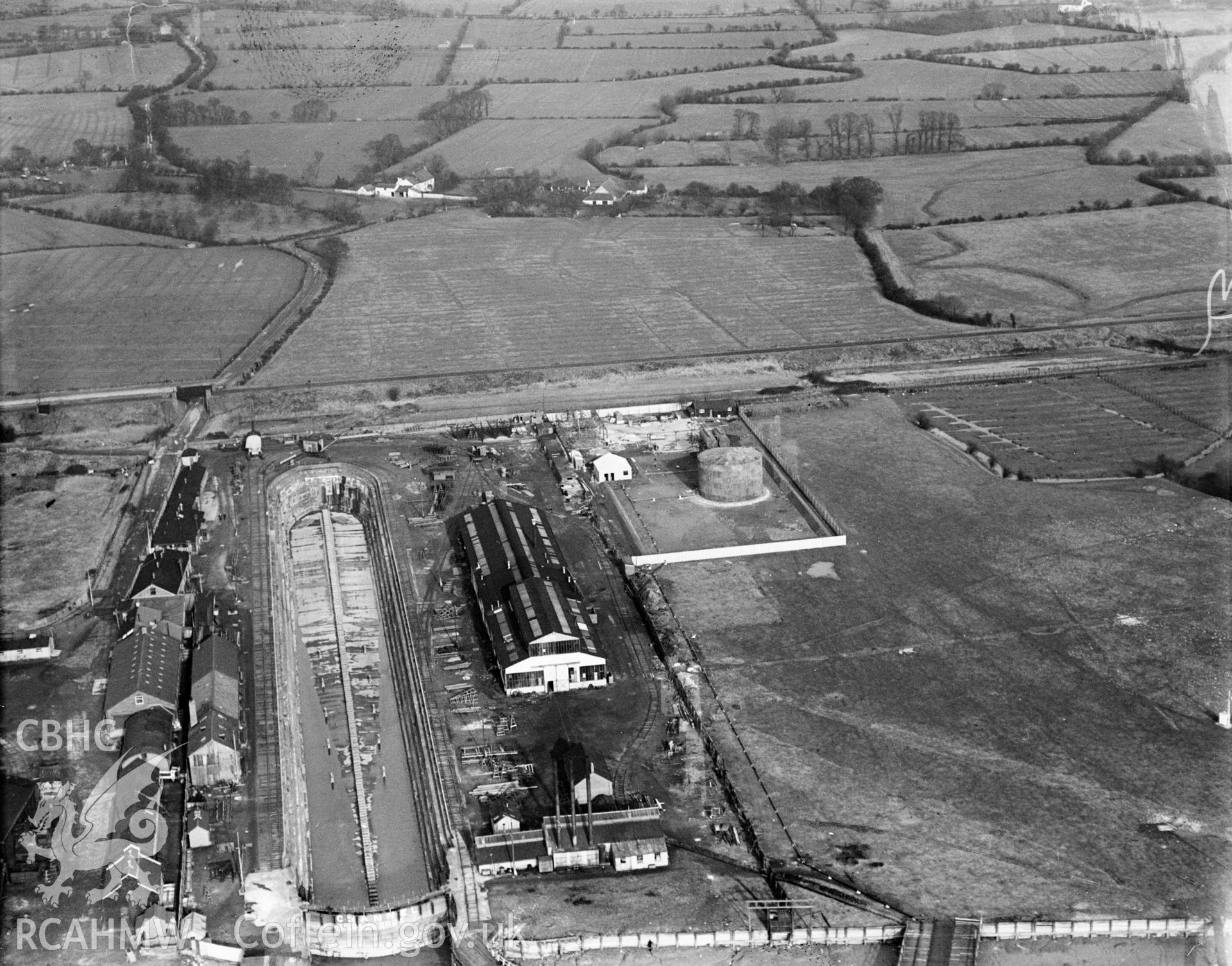 View of British Oil Storage Co., Union Dry Dock, Newport, oblique aerial view. 5?x4? black and white glass plate negative.